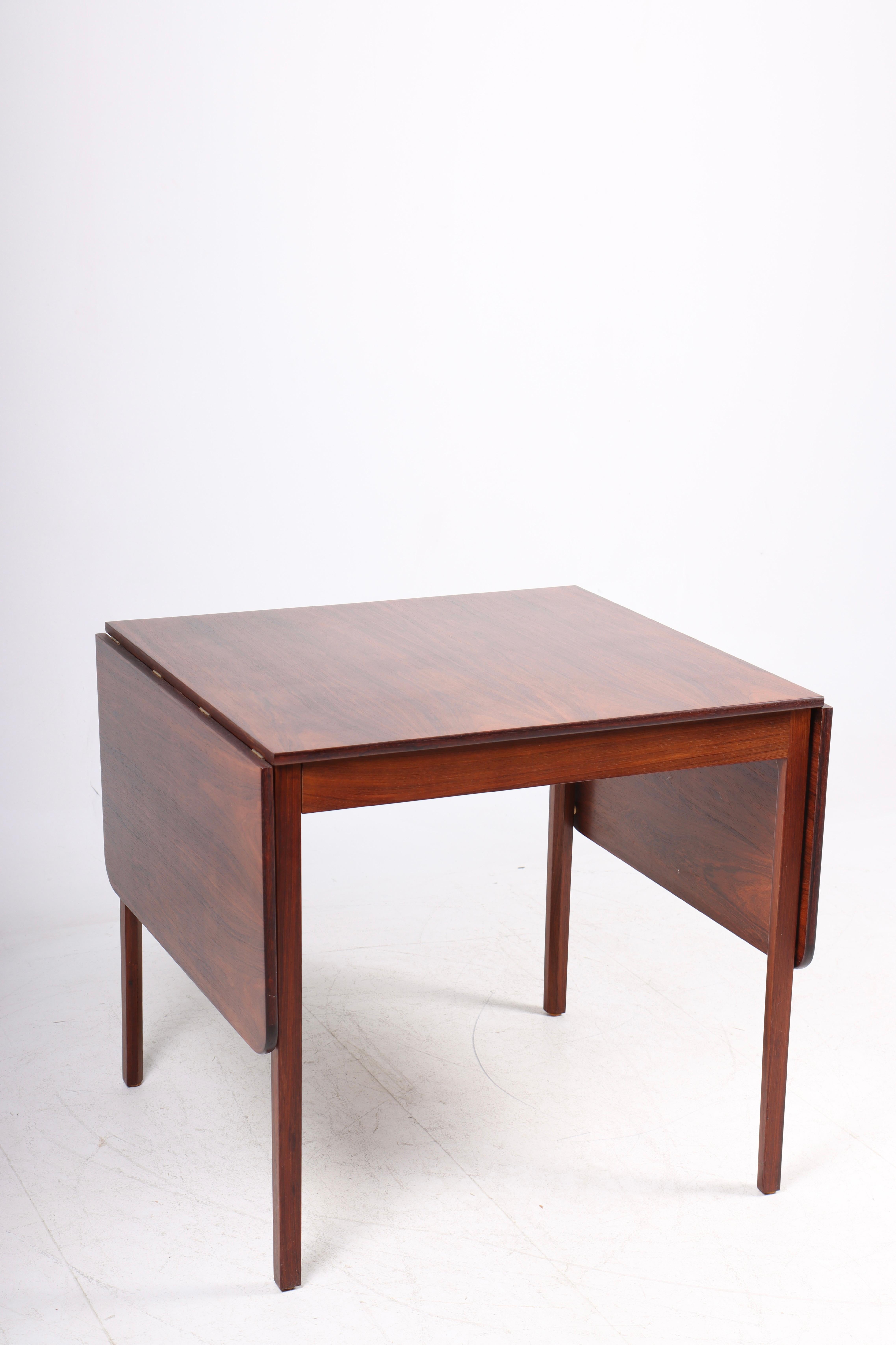Dining table in rosewood. Designed by Ole Wanscher for A.J.Iversen cabinetmakers. Made in Denmark, 1960s. Great original condition.
Total width: 163 cm.