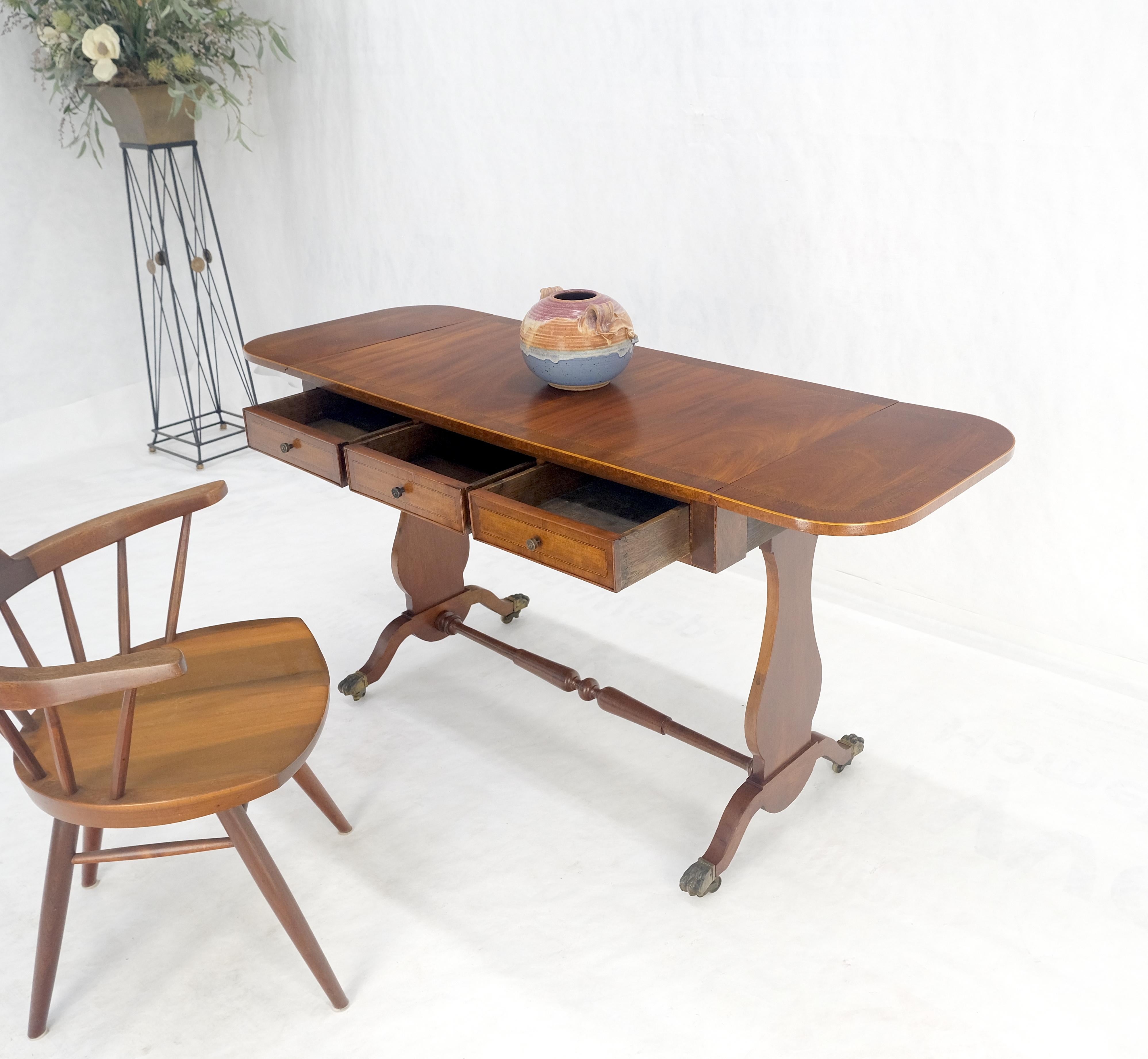 Drop Leaf Sides Dovetail Drawers Banded Inlaid Top Console Writing Library Table MINT!
Brass claw feet, 2 leaves 10in each 61in extended length.
