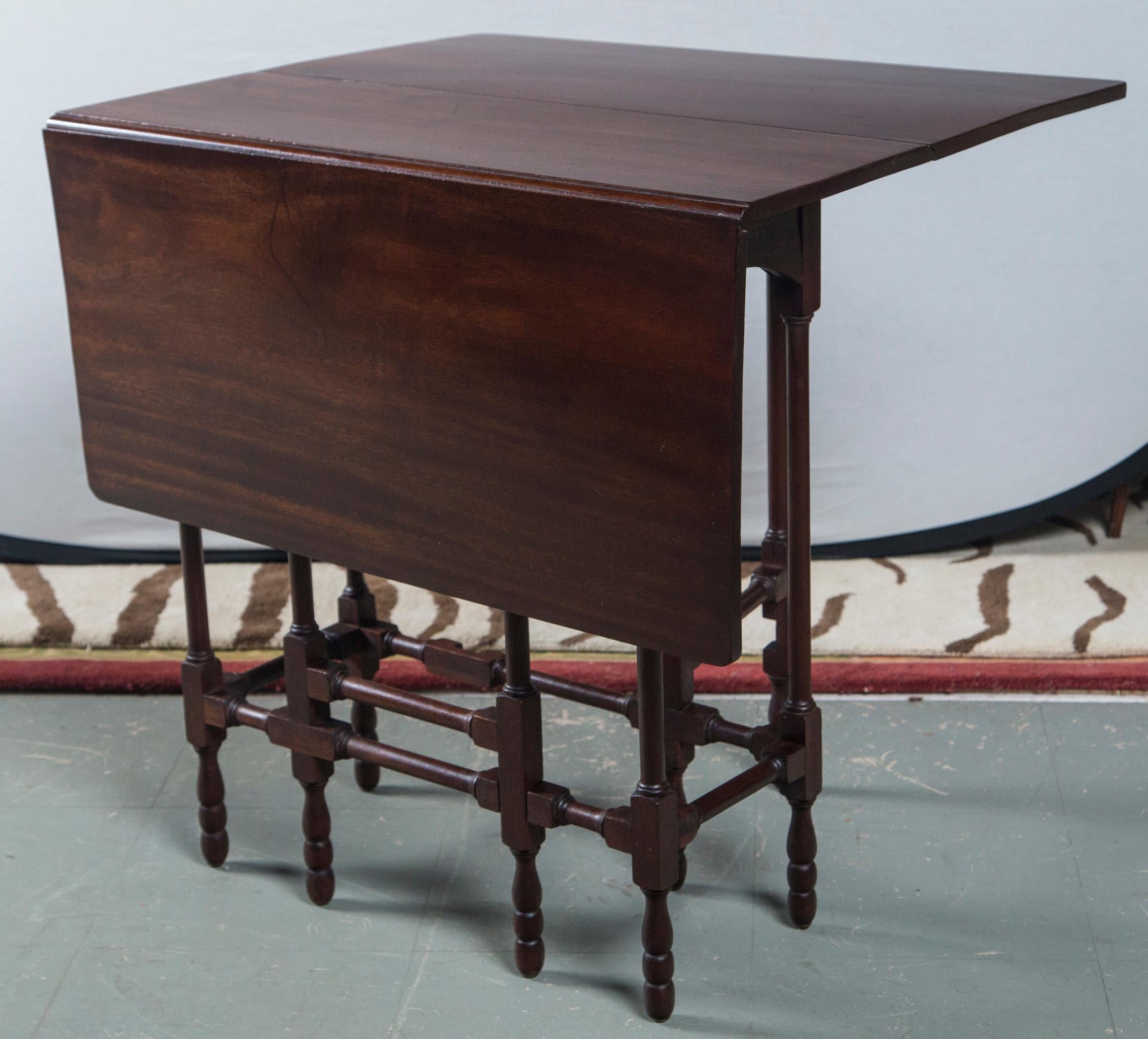 Beautiful mahogany drop leaf table with turnings on legs