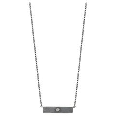 Collier en argent oxydé avec barre de diamants