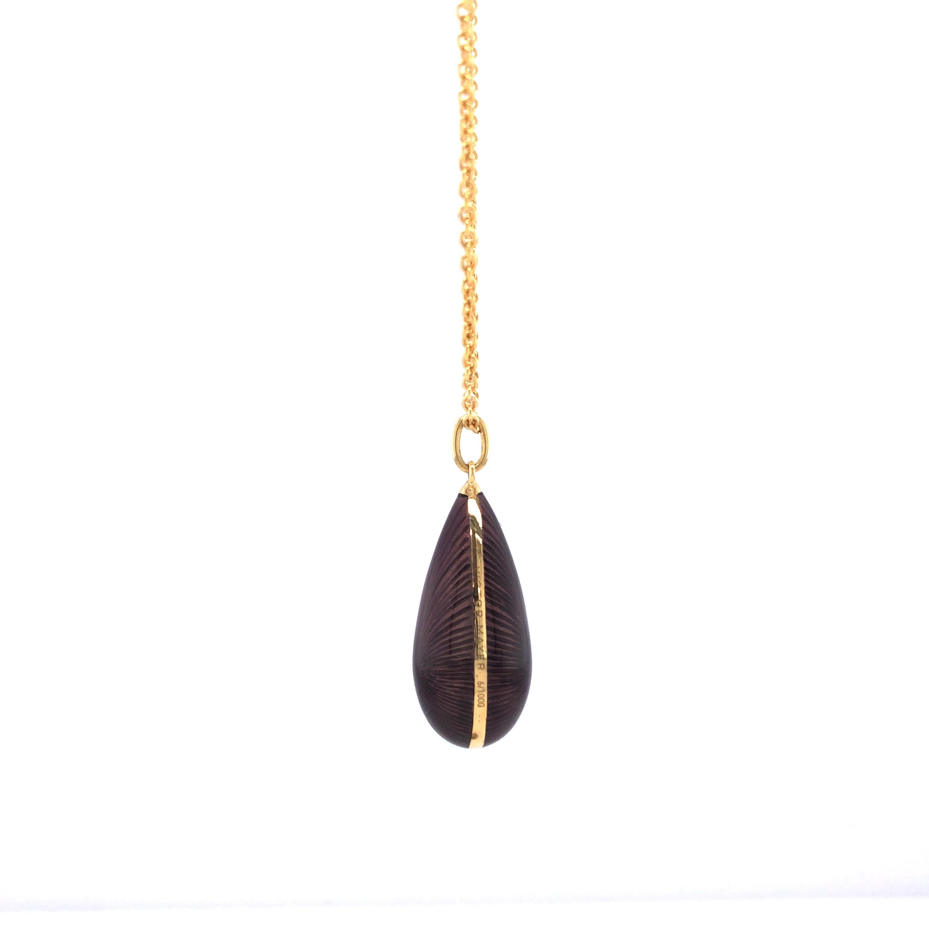 Victor Mayer drop pendant 18k yellow gold, Dew Drop Collection, translucent purple vitreous enamel, guilloche, measurements app. 28.0 mm x 10.0 mm

About the creator Victor Mayer
Victor Mayer is internationally renowned for elegant timeless designs