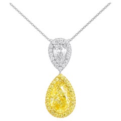 Pendentif avec 3.05ct Fancy Intense Yellow Pear Shape