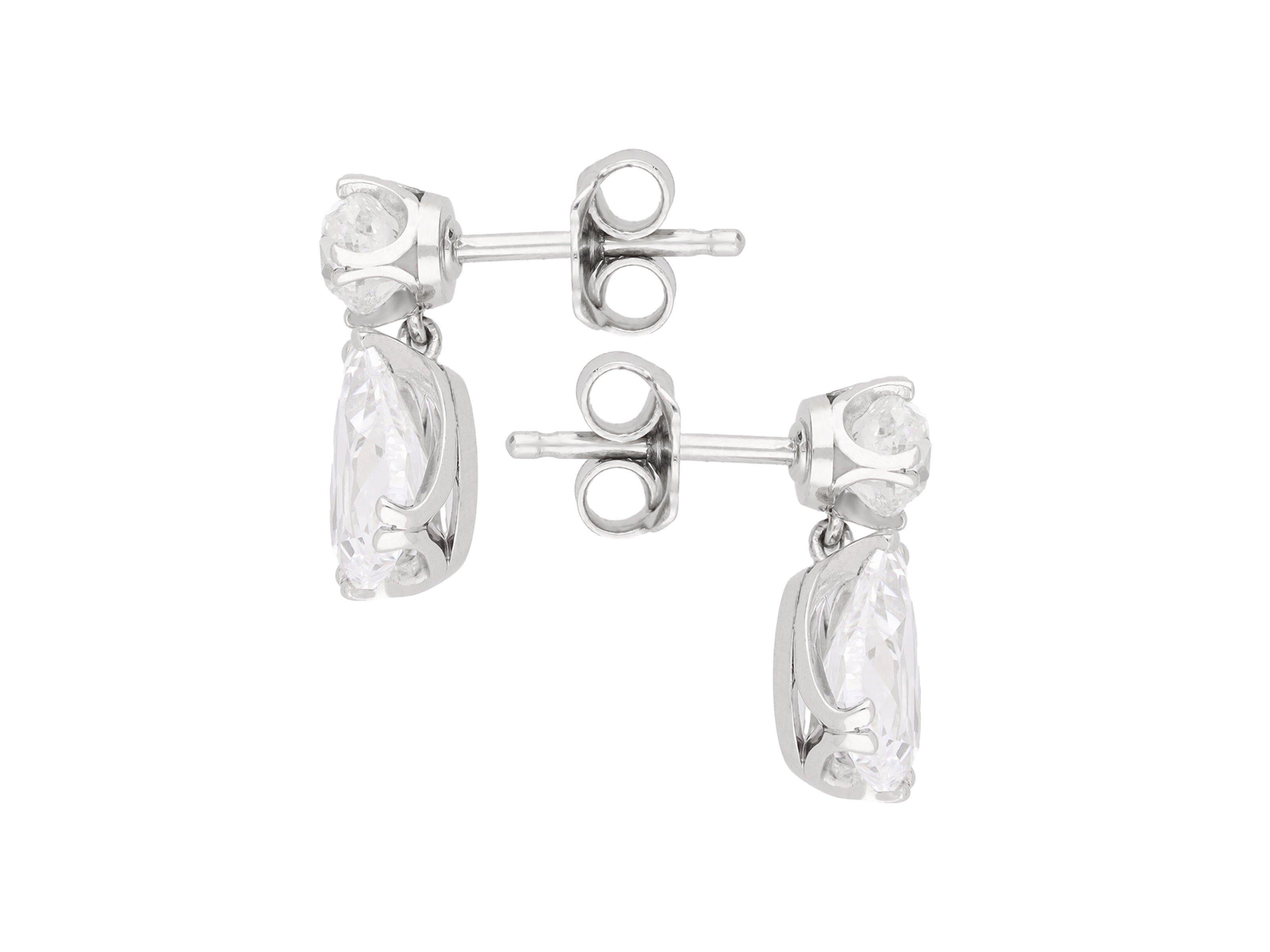 Drop shape old mine diamond earrings. A matching pair, set with a drop shape old mine diamond in an open back claw setting, two in total, one D colour, SI1 clarity with a weight of 1.51 carats, the other D colour, SI2 clarity with a weight of 1.50