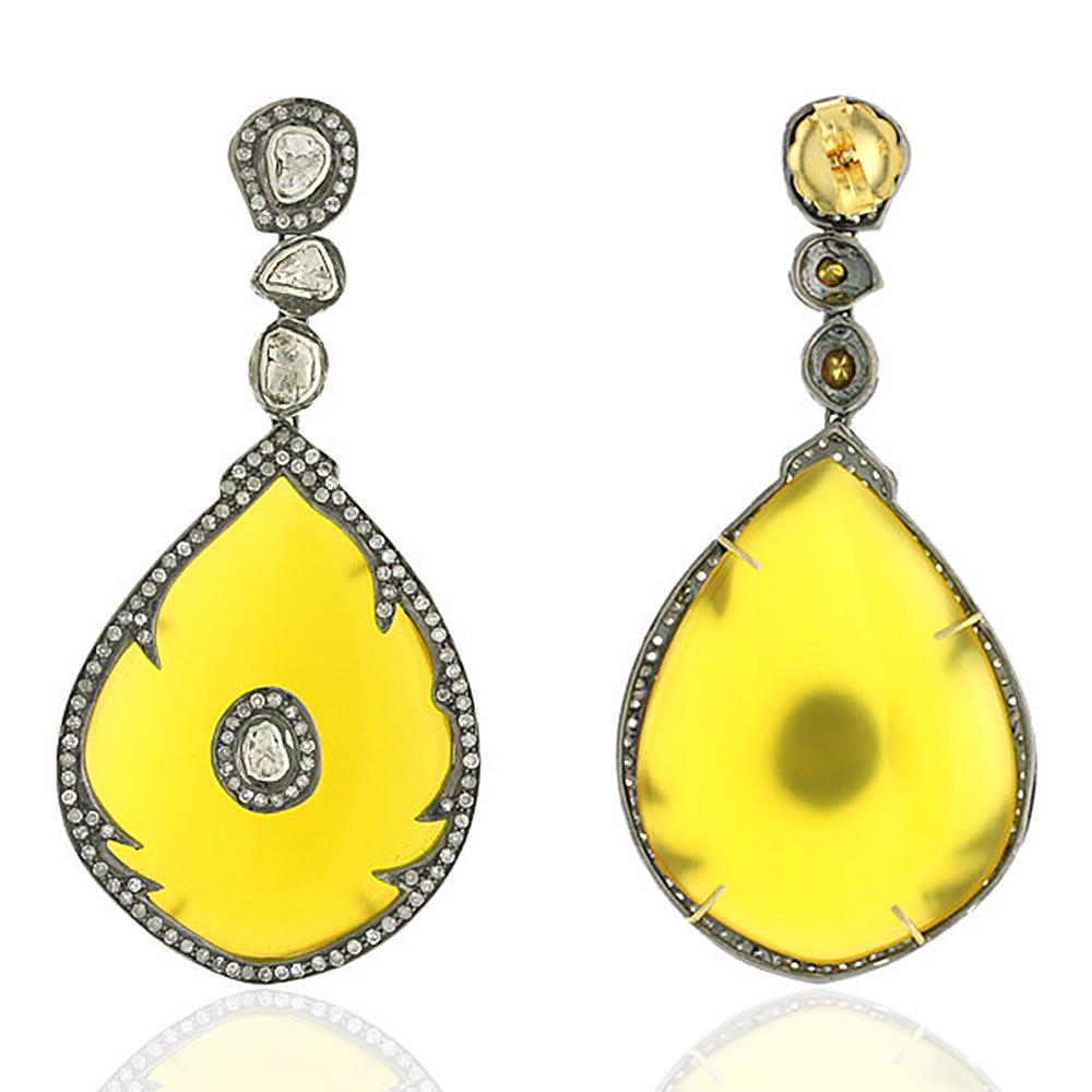 This lovely drop shape Yellow Onyx Earrings with Diamonds is hot and drop dead gorgeous.
Closure: Push Post

18k: 2.31gms
Diamond: 3.44ct
ONYX YELLOW: 65.05Cts