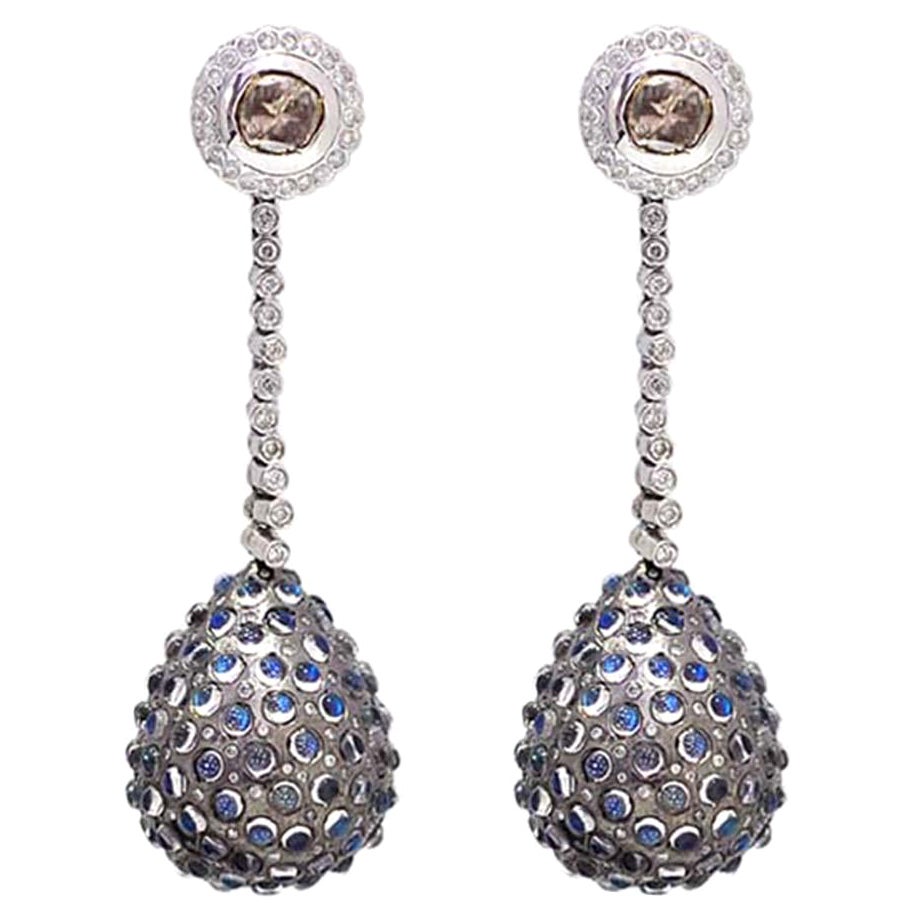 Boucle d'oreille en forme de goutte en or et argent avec diamant et pierre de lune de créateur en vente