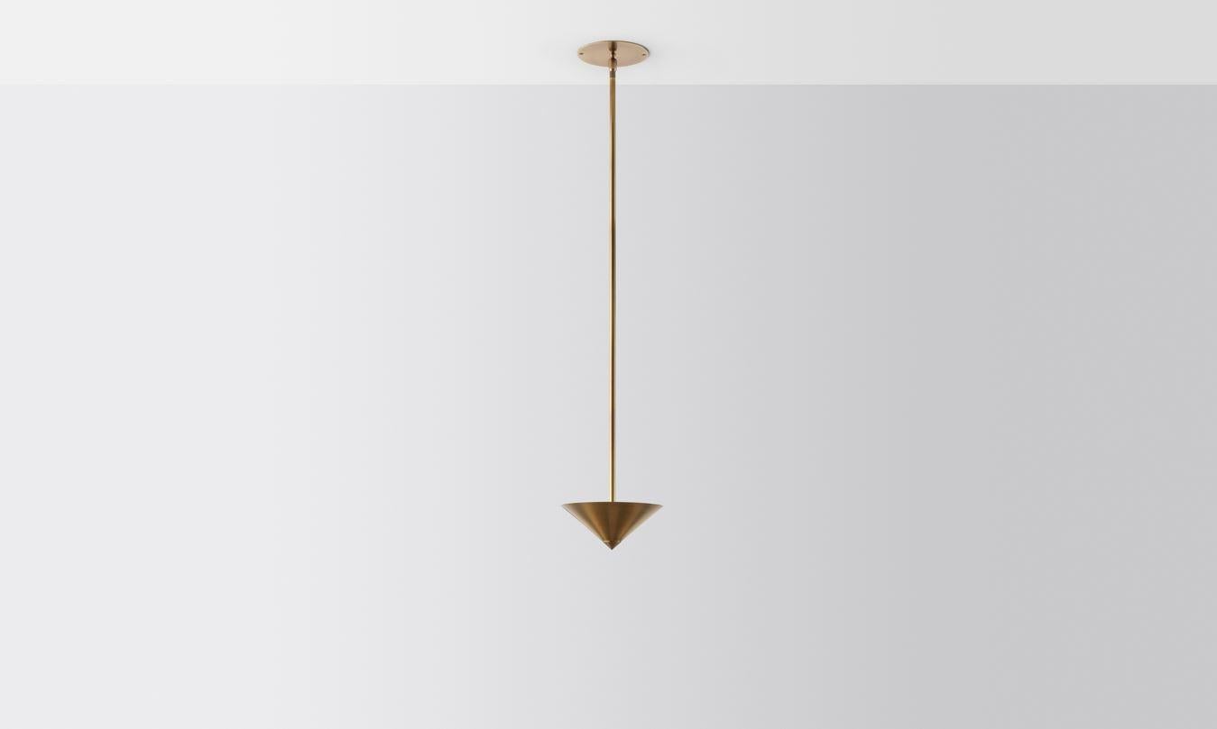 Drop stack 1 pendant light by Volker Haug.
Dimensions: Diameter 21 x height 40 cm.
Material: Brass. 
Finish: Polished, aged, brushed, bronzed, blackened, or plated
Light: 12V G4 LED x 3
Power supply: 110V-240V, 12V transformer supplied
Weight: