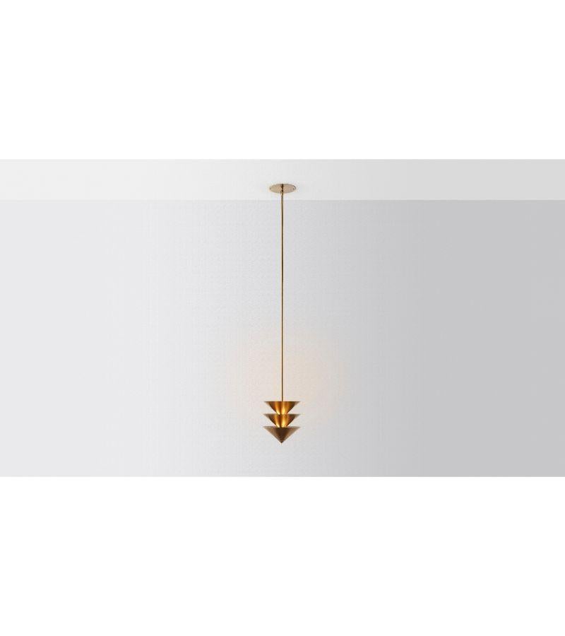 Drop stack 3 pendant light by Volker Haug
Dimensions: diameter 21 x height 53 cm 
Material: brass. 
Finish: polished, aged, brushed, bronzed, blackened, or plated
Light: 12V G4 LED x 9
Power supply: 110V-240V, 12V transformer supplied
Weight:
