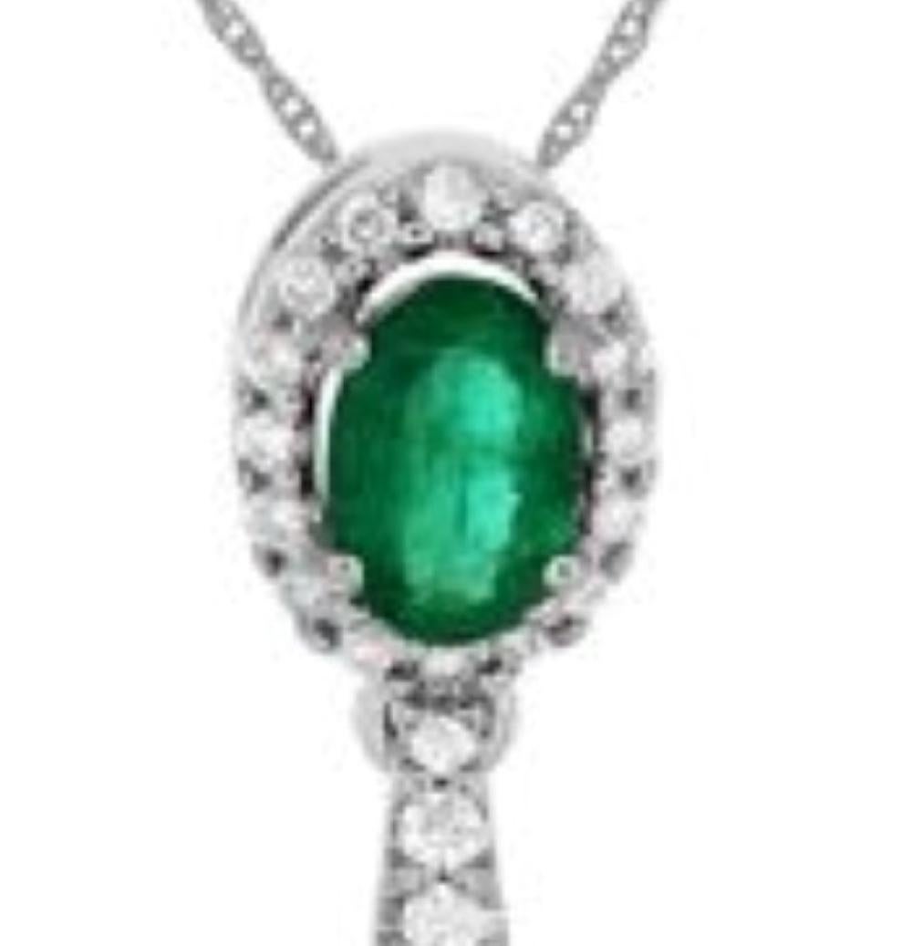 Emerald and Diamond Pendant with 2 Oval Cut Emeralds that weigh 1.60 carats total and 56 Round Brilliant Cut Diamonds that weigh .56 carats total, 14kt white gold.
