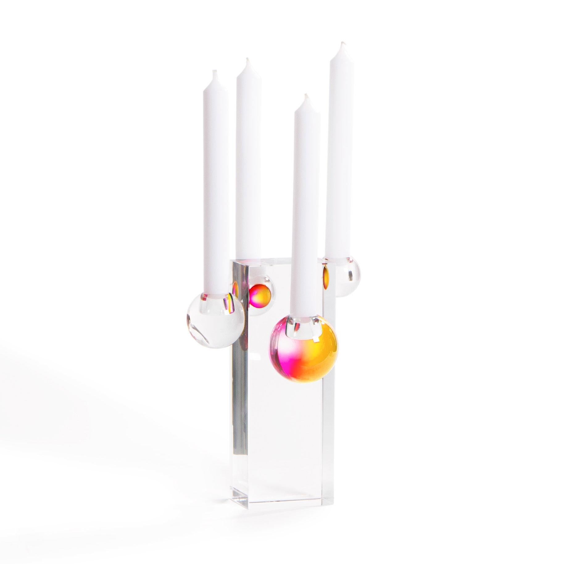 Candelabra for 4 candles.
4 crystal balls are applied to a solid monolithic crystal block, using a special pigmented bond that reveals a unique tie-dye effect.
Extinguish flame before it touches glass. Never leave a flame unattended.

Dimensions:
16