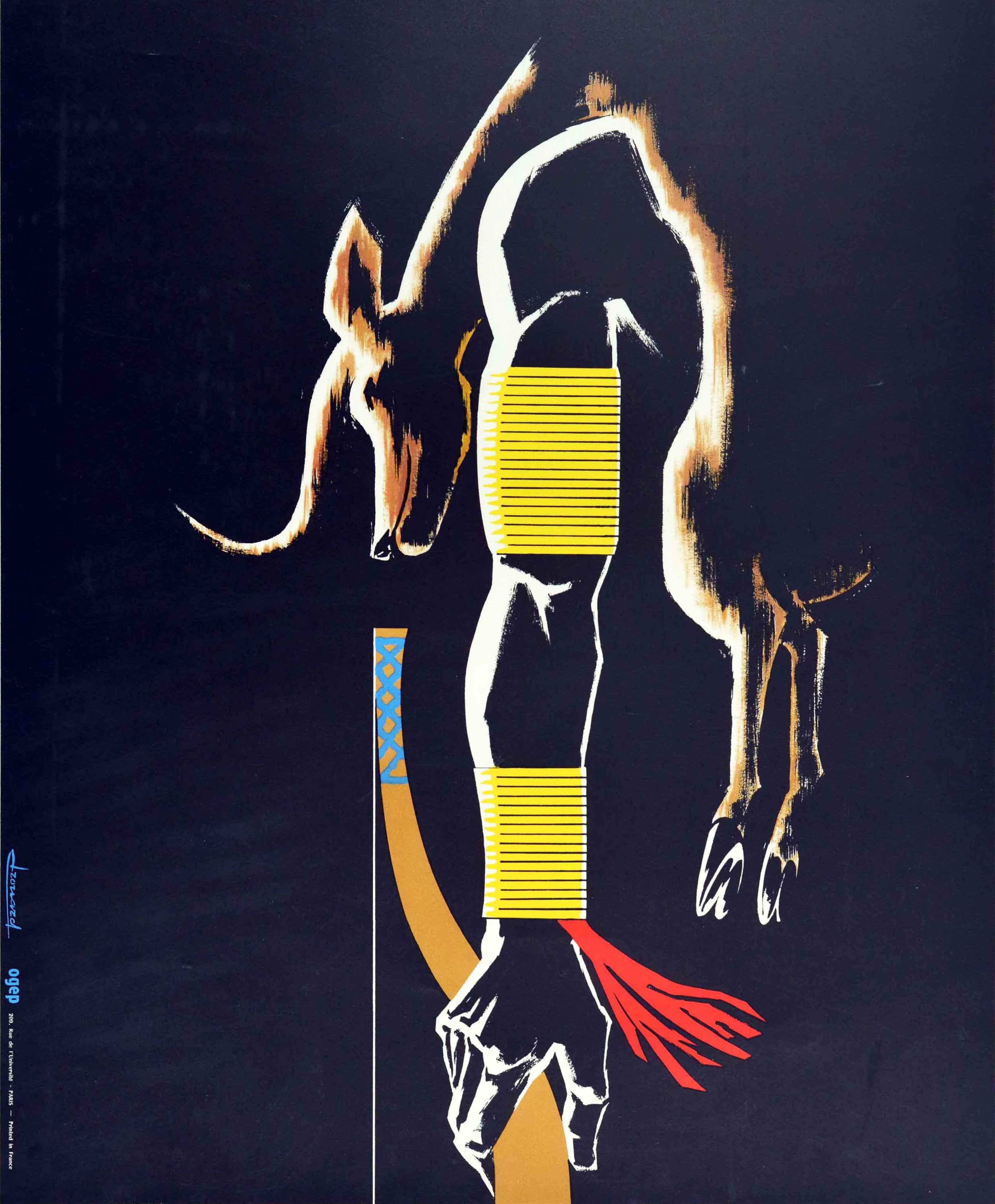 Original vintage travel poster for Mali in West Africa featuring a colourful artistic image on a dark background of a hunter's arm with an antelope draped over his shoulder and a bow in his hand, the bold title lettering above. Printed in Paris.