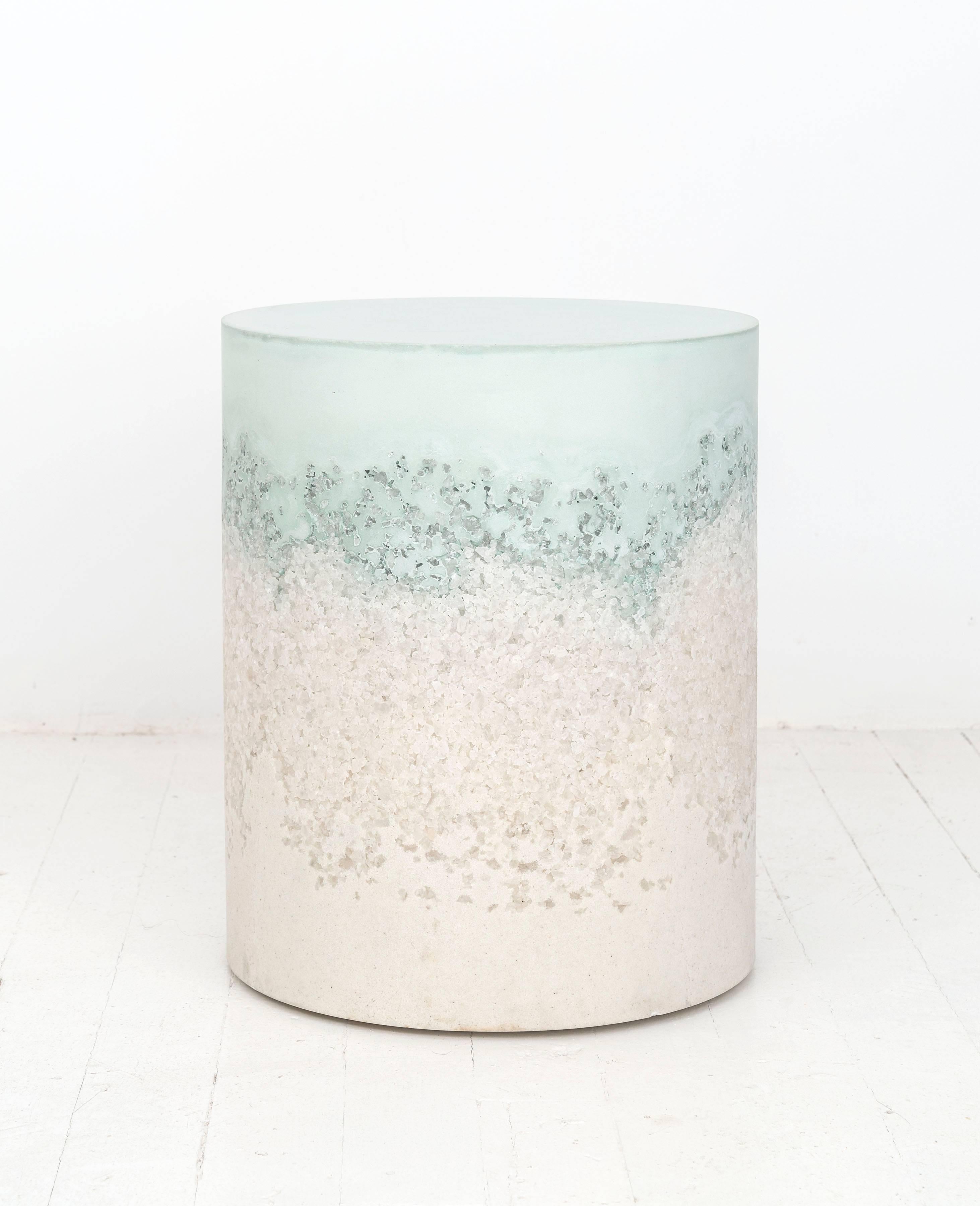 A layering of cement and crushed aggregates, the made-to-order drum consists of an hand-dyed celadon cement top and a packed white rock salt bottom. Poured by hand over the jagged minerals, the celadon cement merges the materials to create a unique