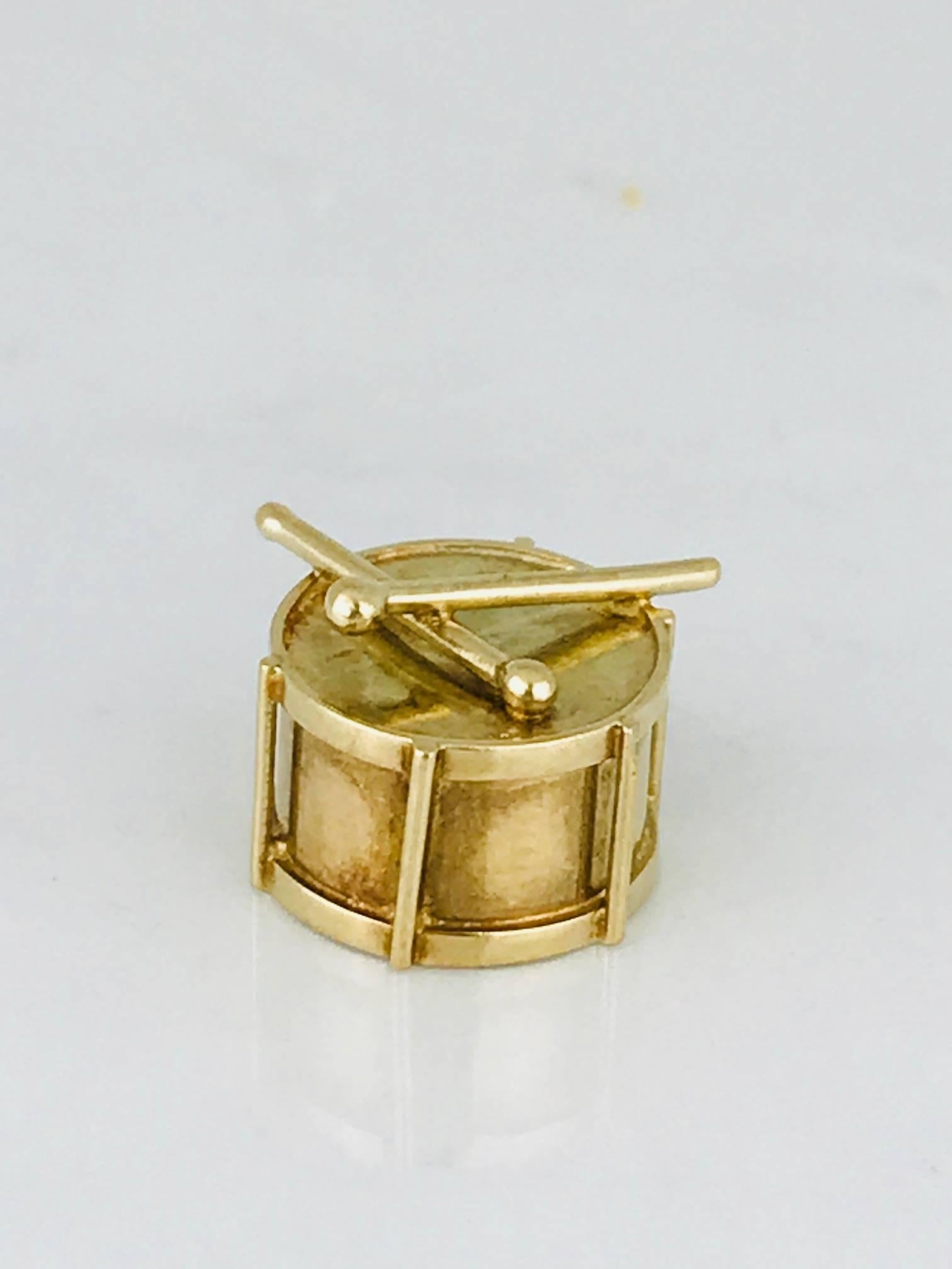 Drum Charm, 14 Karat Yellow Gold, Circa 19350's
Vintage, unique and hard to find Drum Charm can be used for charm bracelet or necklace

GIA Gemologist, inspected & evaluated