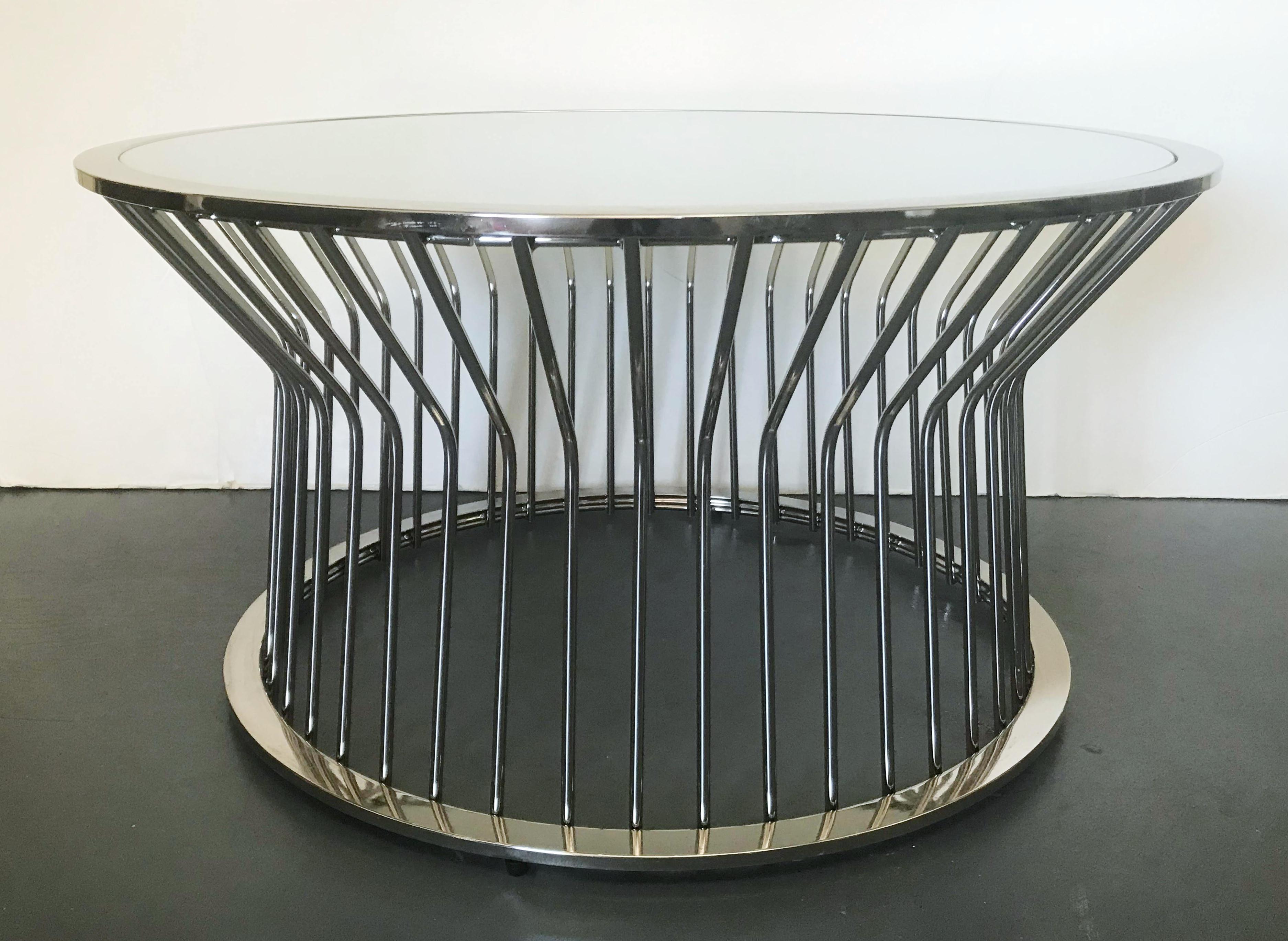 Vintage round coffee or cocktail table with chrome base and frosted glass top / Made in the USA, circa 1970s
Measures: Diameter 35 inches, height 18 inches
1 available in stock in Palm Springs
Order reference #: FABIOLTD F171