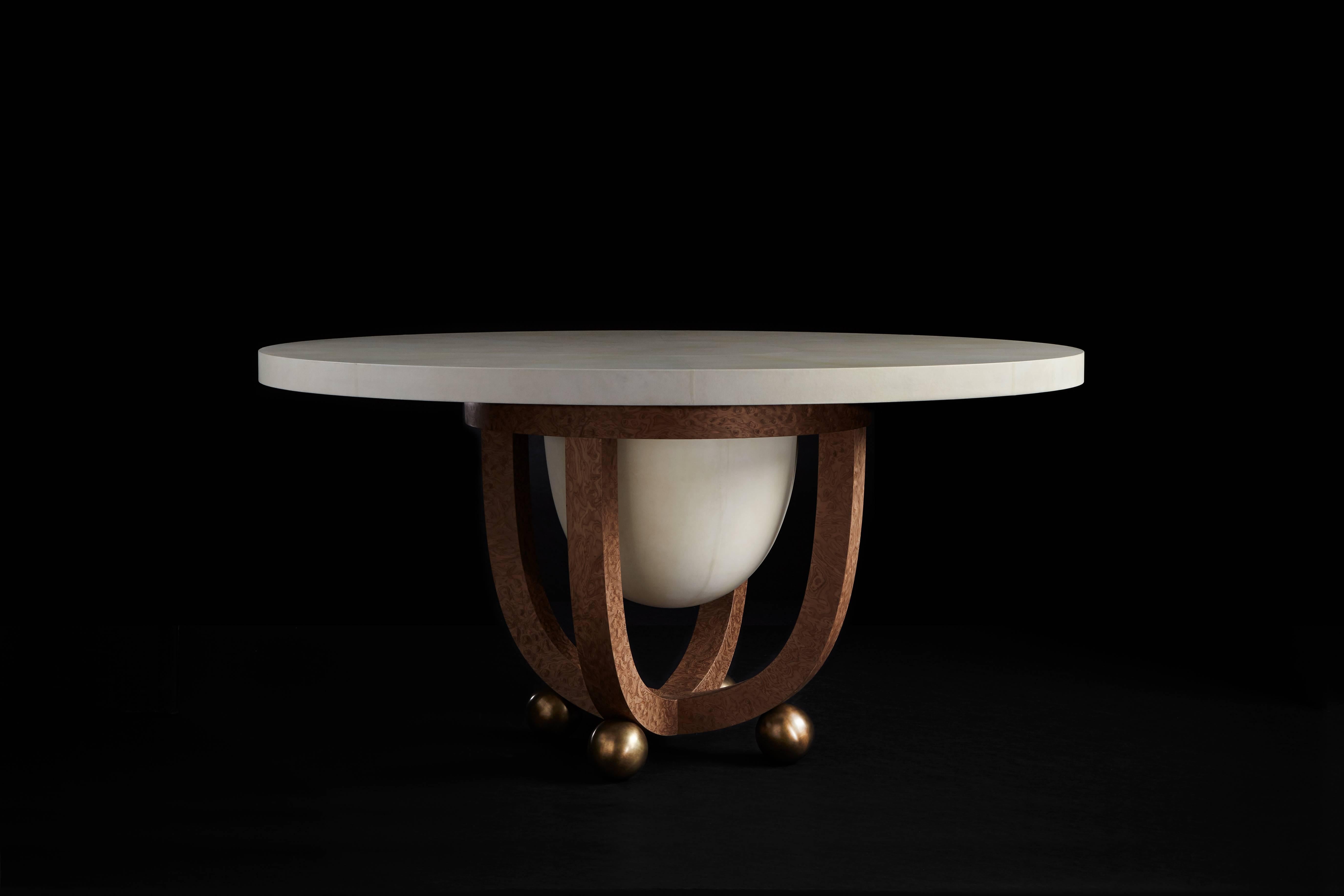 The Drum series references Tombak, a foundational instrument in Persian music, as a point of departure. Parchment is hand-stretched over the table surface, and the veneered legs curve to echo the shape of the suspended parchment volume. 

Natural