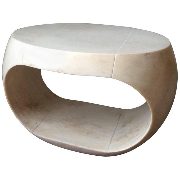 Curved side table. Available in standard or large sizes.

Cast Resin comes in metallic or non-metallic finish. 

Leather, parchment
Brass, bronze, pewter, copper, and silver

Lead time is 6-8 weeks.
    