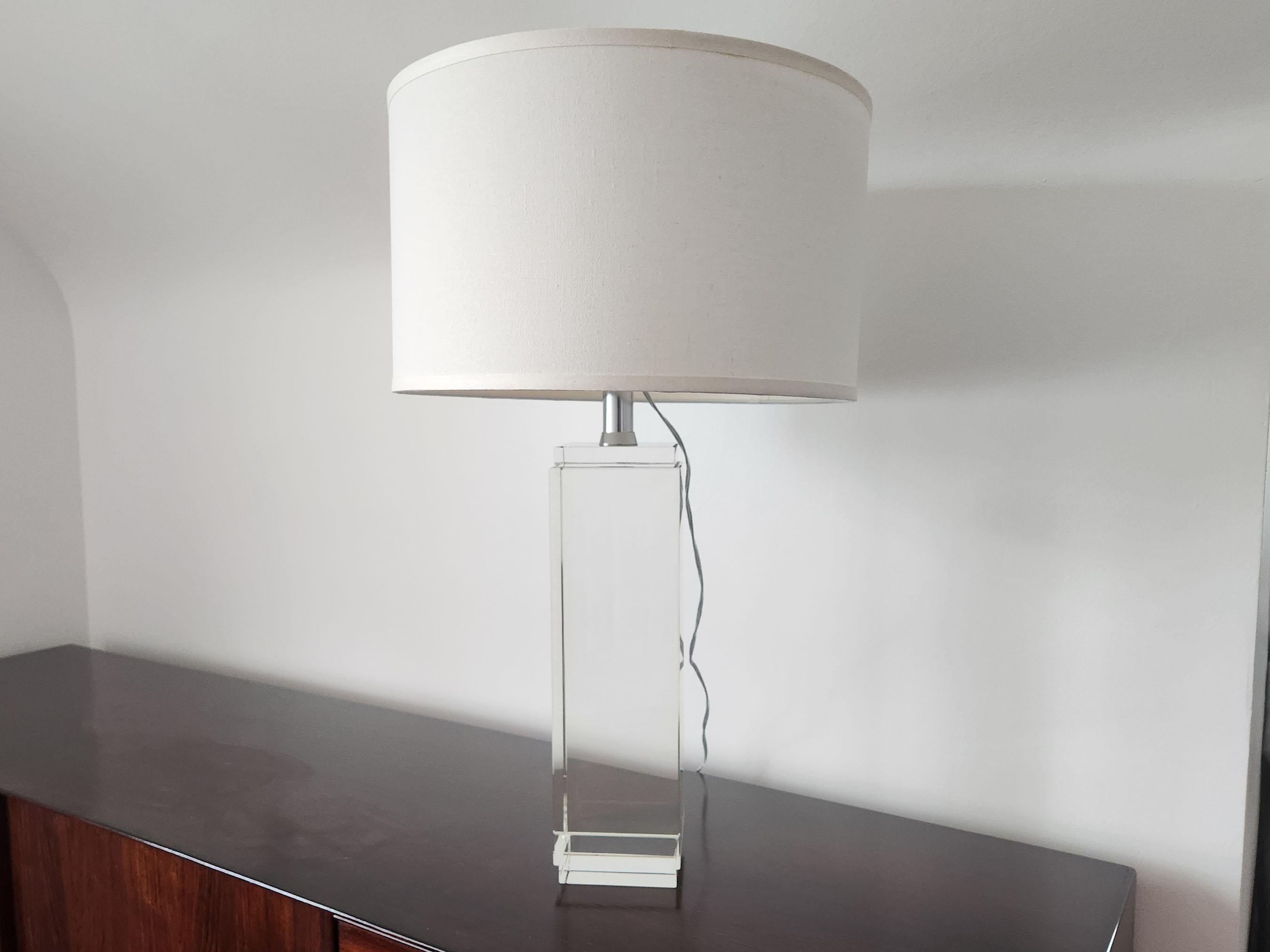 This square column crystal table lamp is modern in its simplicity, so brilliantly compact. The fun geometric shape brings a little life to bedside tables and beyond. The gorgeous crystal base is accented with a reduced foot print.

Bulb Included: 