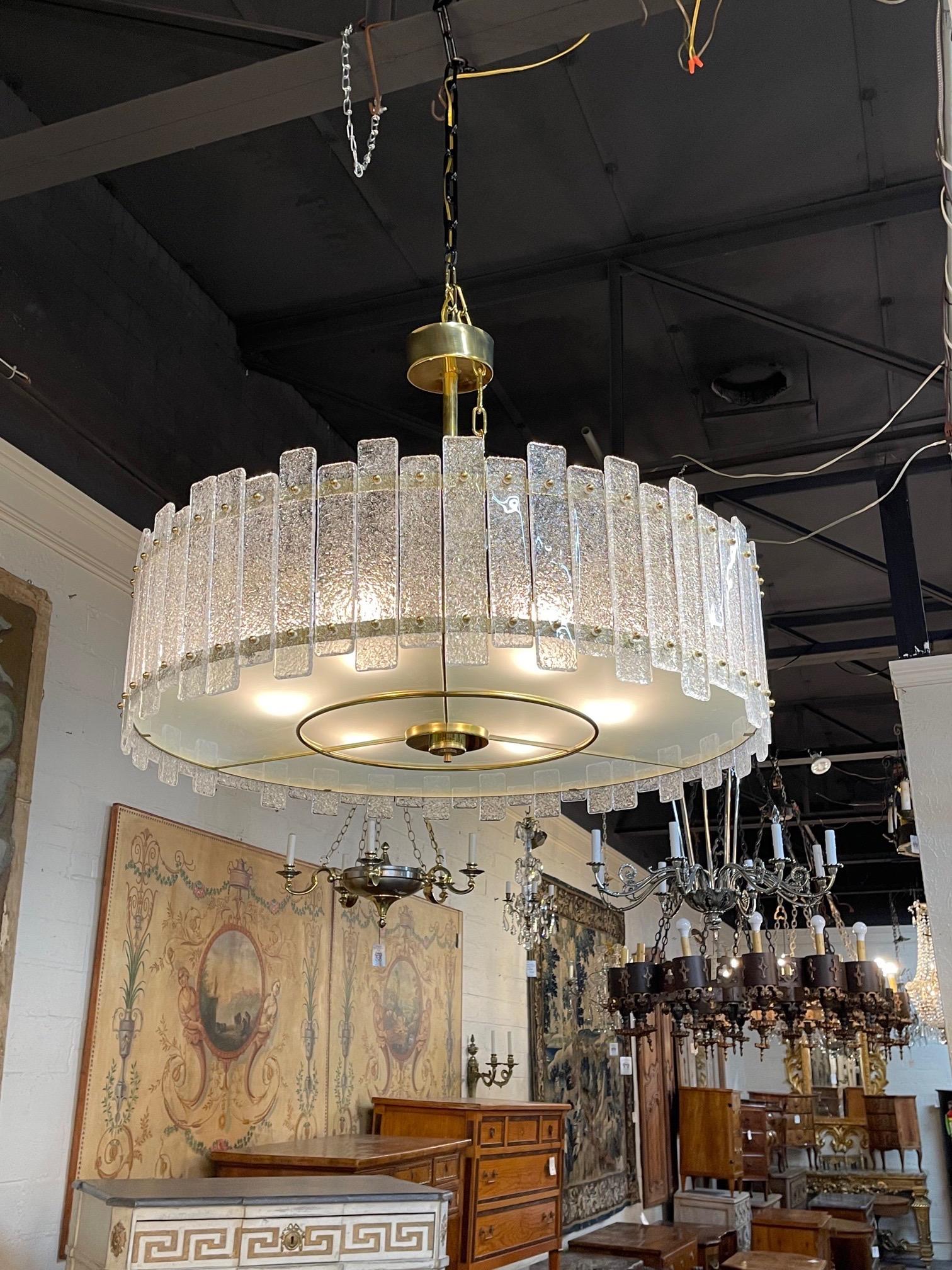 Exquisite shaped drum shaped modern Murano glass and brass chandelier. Beautiful textured glass on a decorative base. So pretty and stylish!!