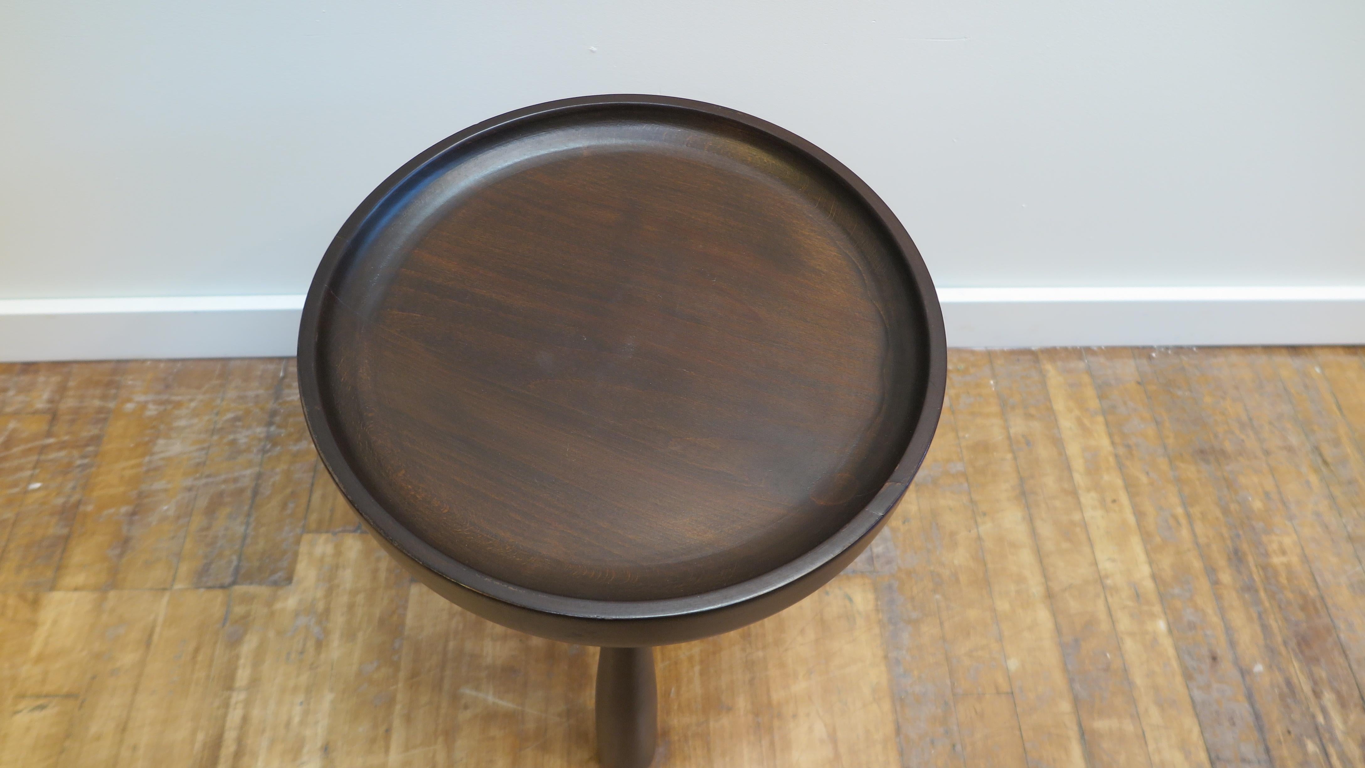 Three legged drum stick side table. Solid wood side table with dish style top of high quality having a style similar of items designed by Jean Royere and Charlotte Perriand.  Strong and sturdy with a beautiful shape that is aesthetically pleasing