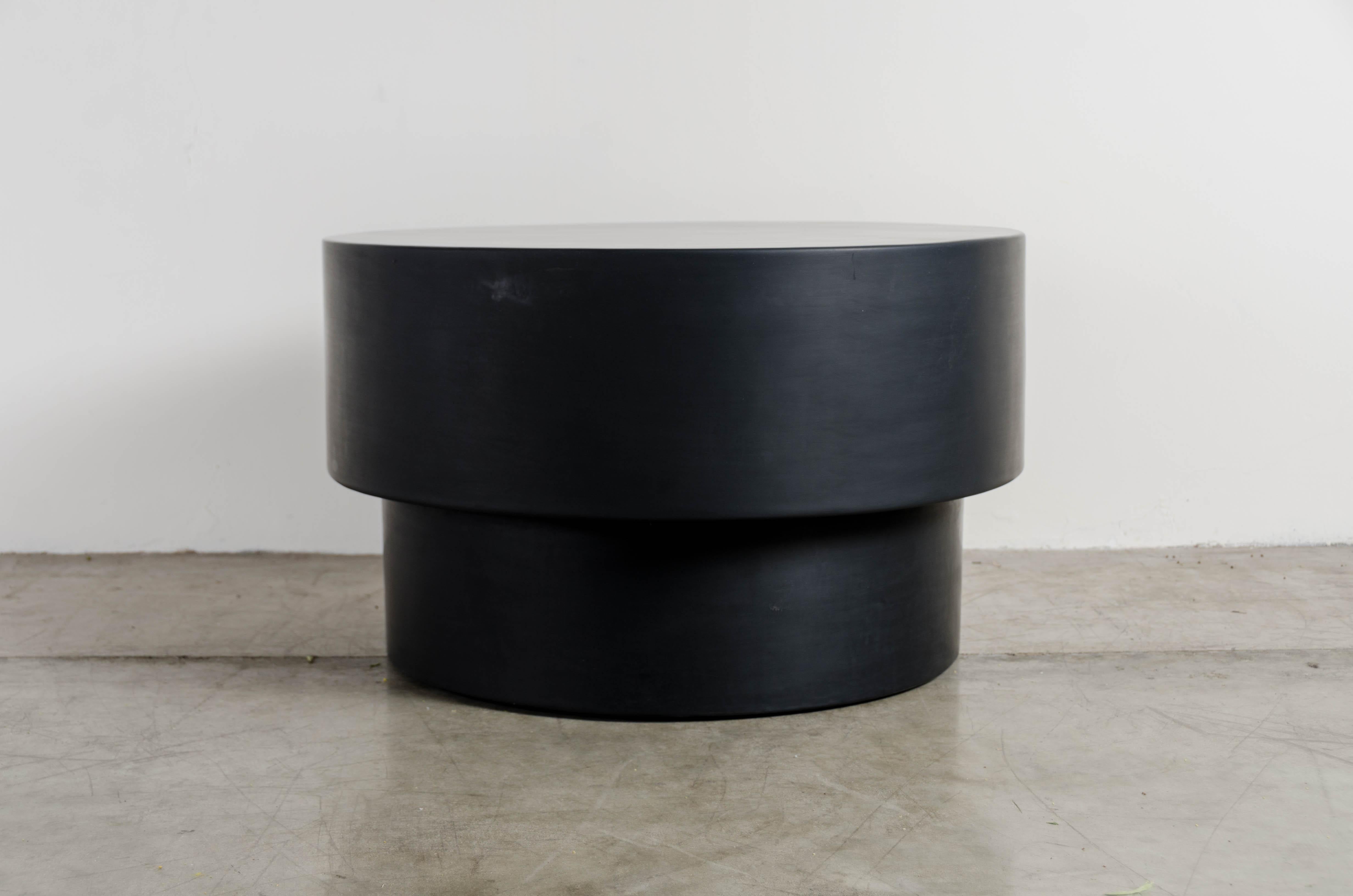 Drum table
Black lacquer
handmade
Hand repousse
Metal base
Limited Edition

Lacquer is a technique that dates back to the Shang dynasty, circa 1600-1100 B.C. These pieces are made with at least 60 coats of organic lacquer. Each layer of