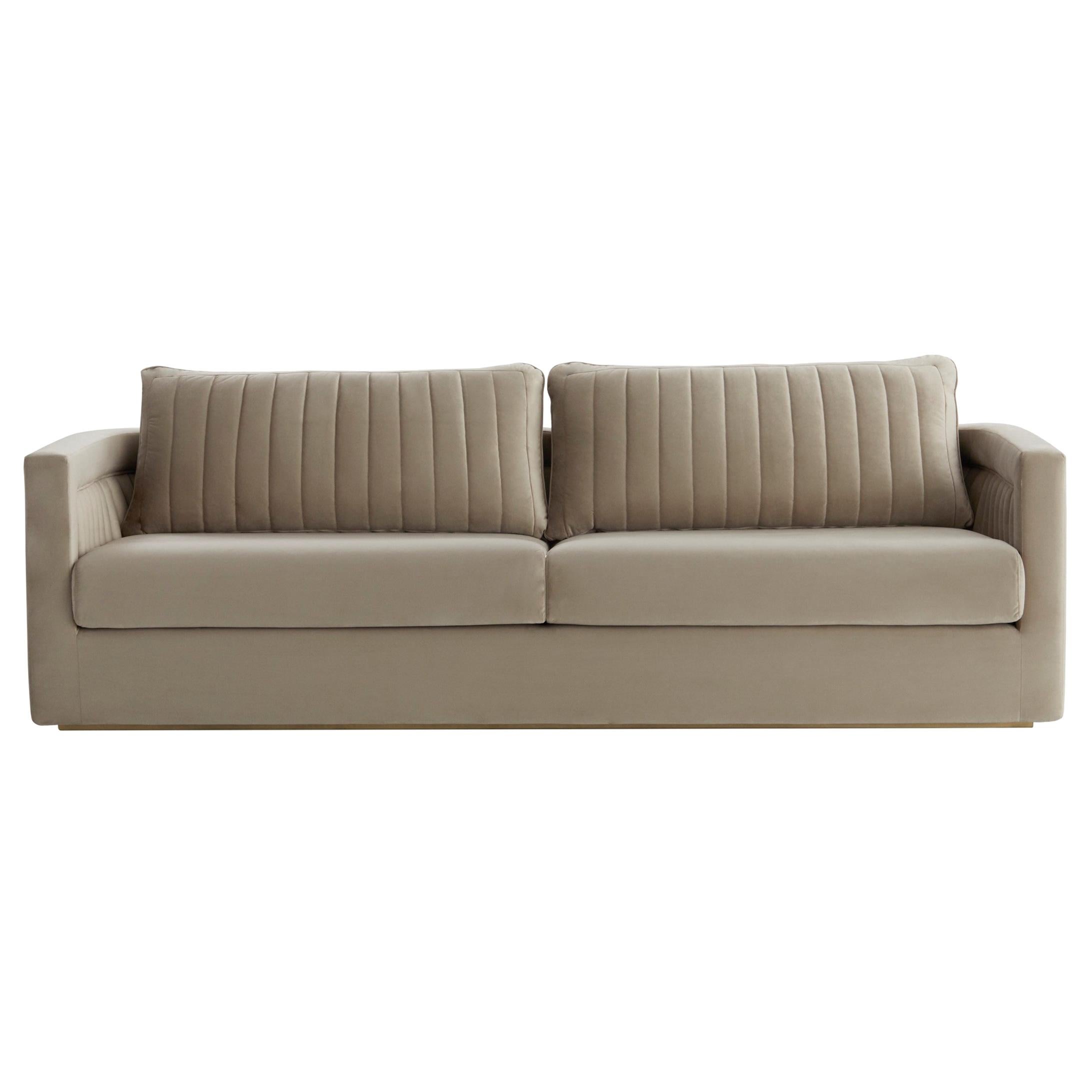 DRUMMOND sofa with back quilting and brass color plinth For Sale