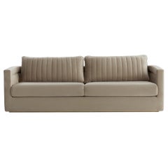 DRUMMOND sofa with back quilting and brass color plinth