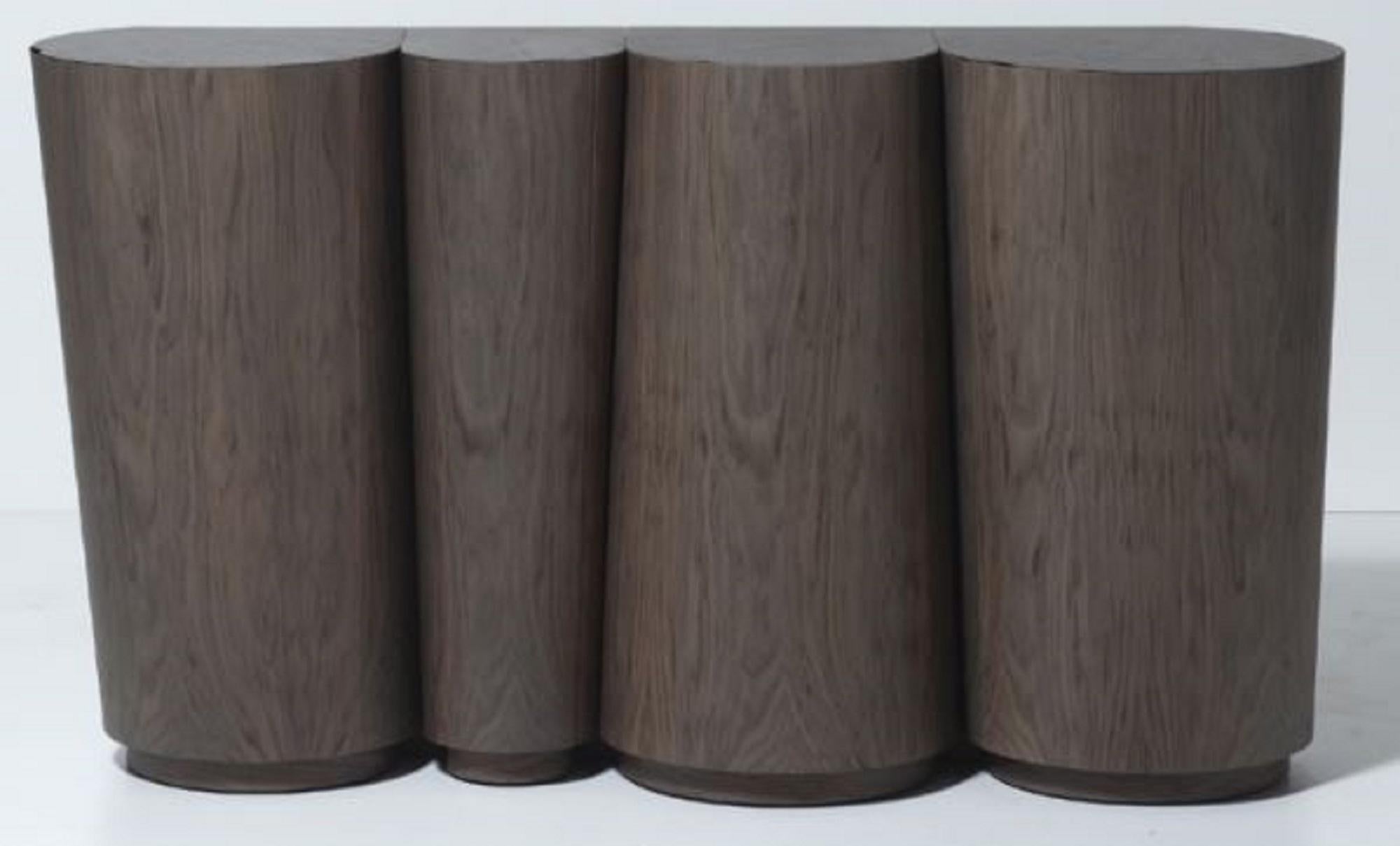 DRUSO SIDEBOARD
Designed by Ferruccio Laviani for Emmemobili

Druso, designed by Ferruccio Laviani for Emmemobili, is a sideboard characterized by its warm and reassuring shape, making it truly one-of-a-kind. The structure and doors are crafted from