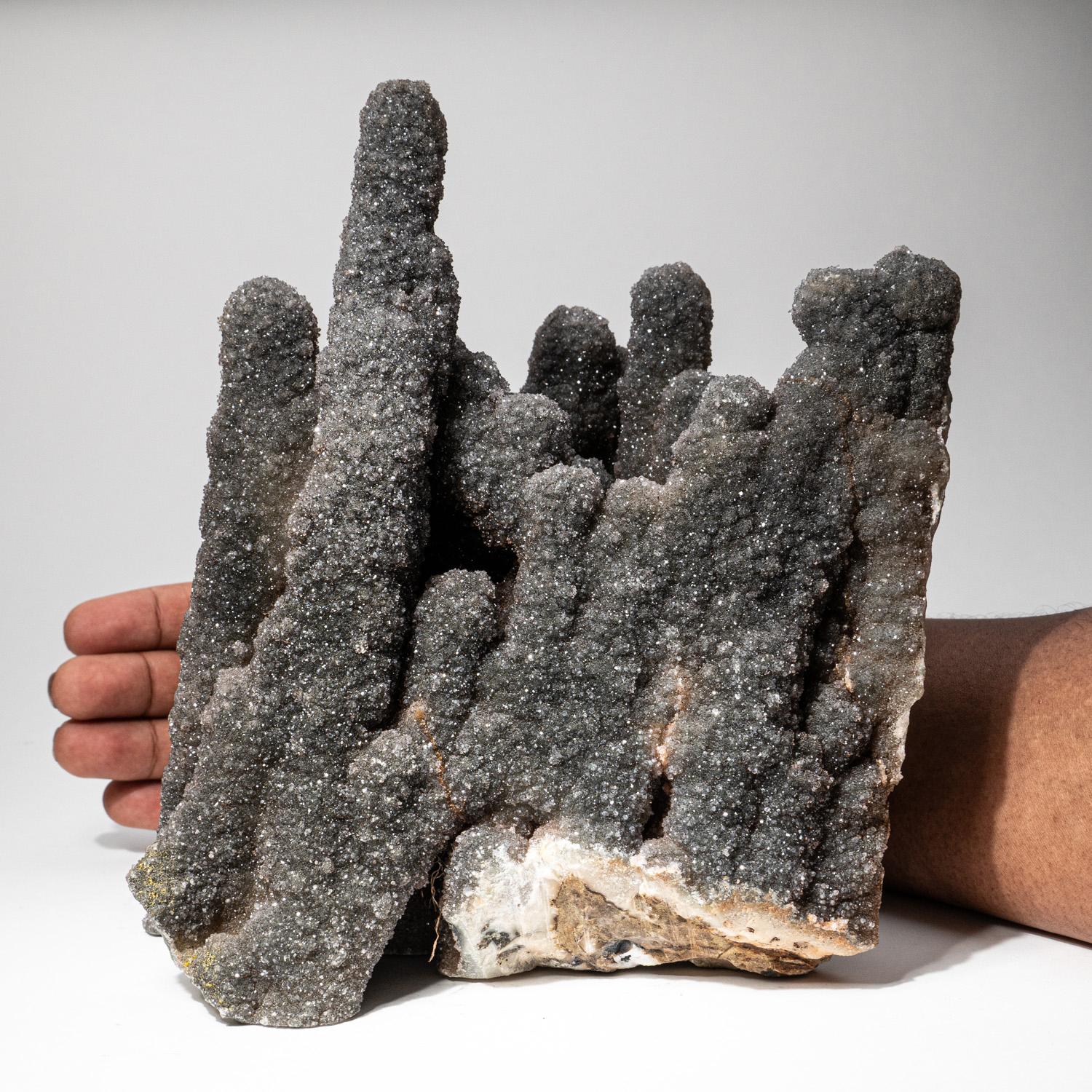 This amazing stalactite formations are the height of beauty, with glittering druzy crystalline blossoms covering a cluster of long, finger-like projections. A stunning choice for any collection. Stalactite balances the energies of the mind, body and