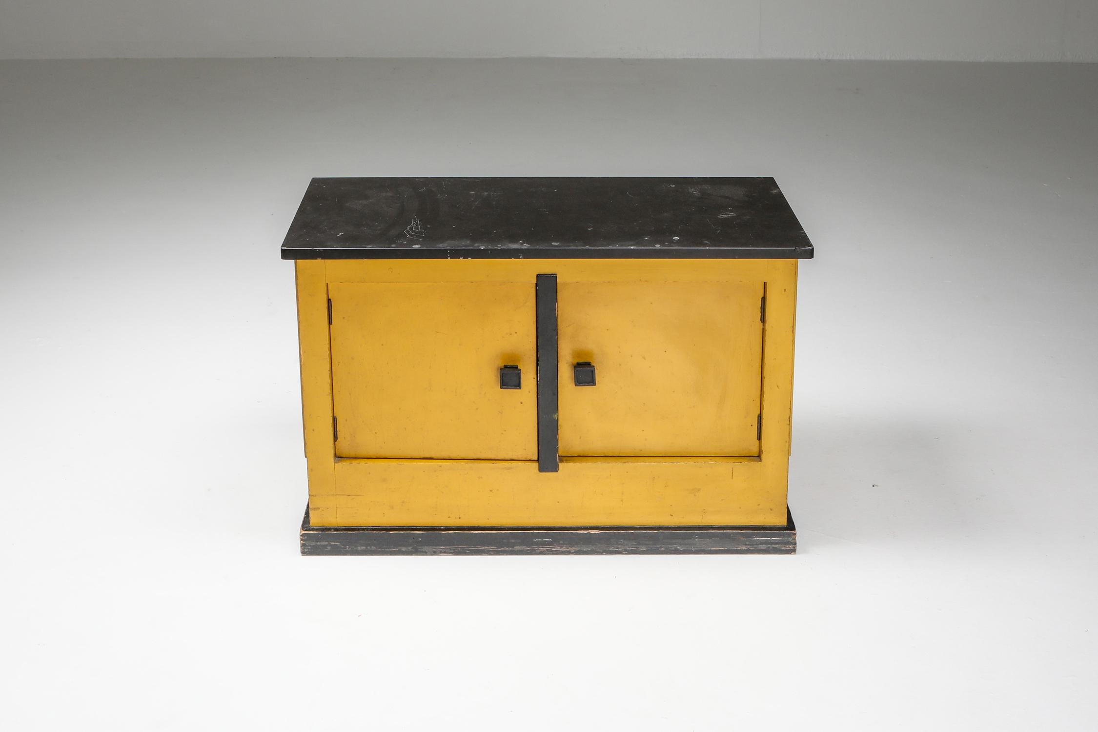Modernist yellow and black bar cabinet with cooler, Hendrik Wouda, H. Pander & Zonen, Netherlands 1924

Painted pine, black marble top

The Interbellum, the period between the two World Wars, was a time when culture Dutch blossomed. Architects,