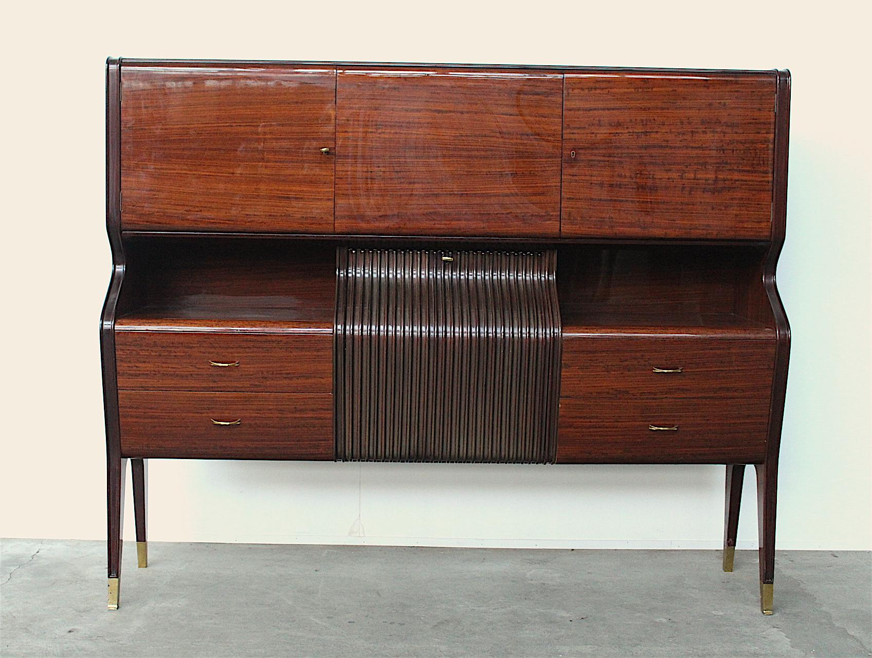 One of the most beautifully made pieces of midcentury furniture that I know of. This is a pre-Tecno piece by the hand of Borsani in his then-called Atelier Arradamenti Varedo, when the firm was housed in the North Italian town with the same name.