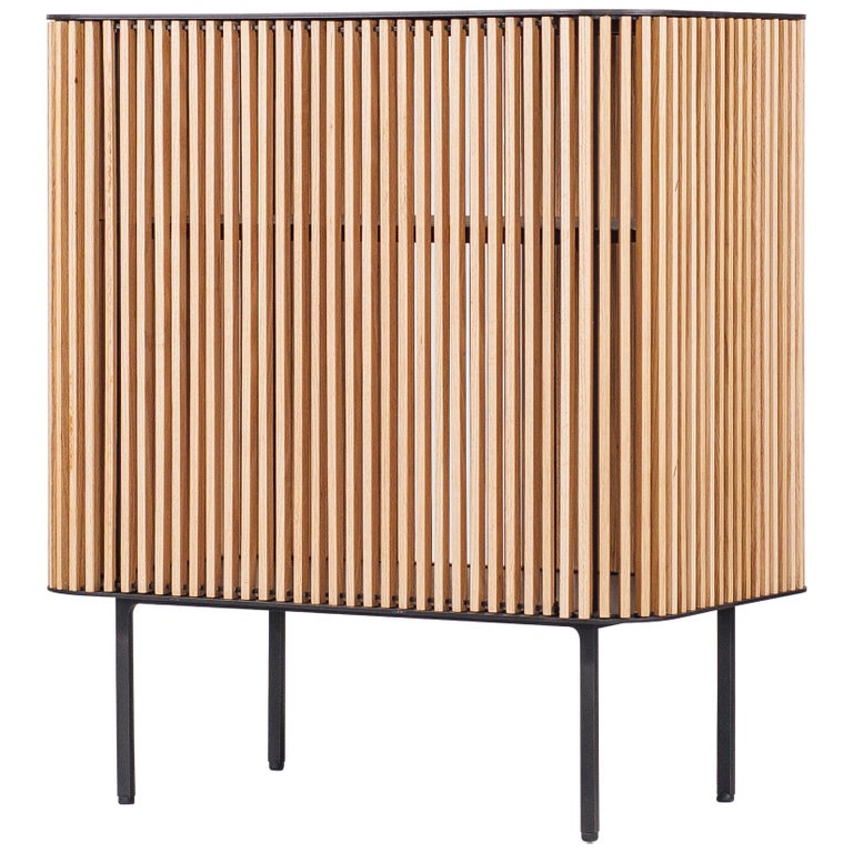 Dry bar in blackened laser-cut steel and oak with leather top, new