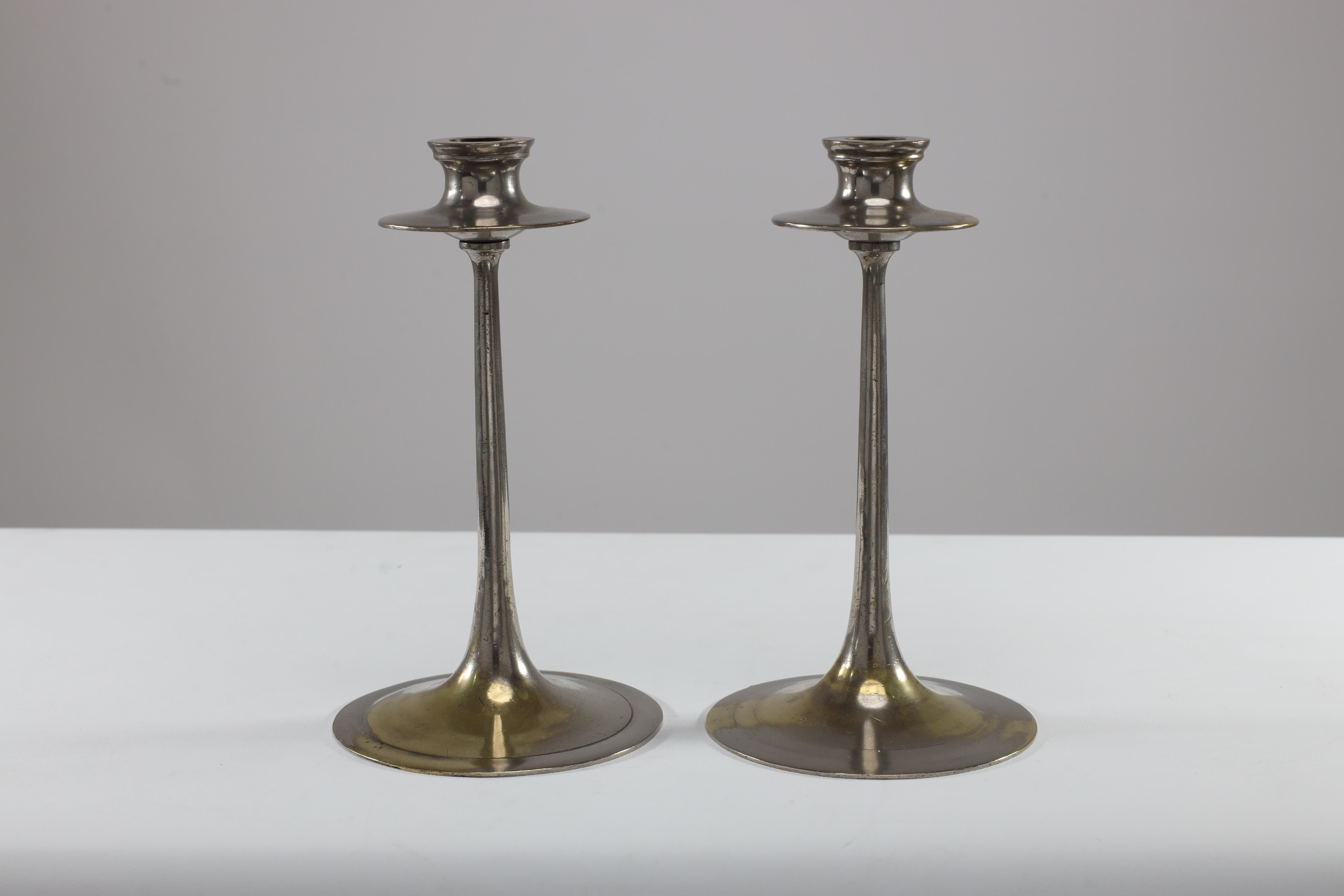 Dryad of Leicester. A pair of Arts and Crafts silver plated on brass candlesticks. Price for the pair.