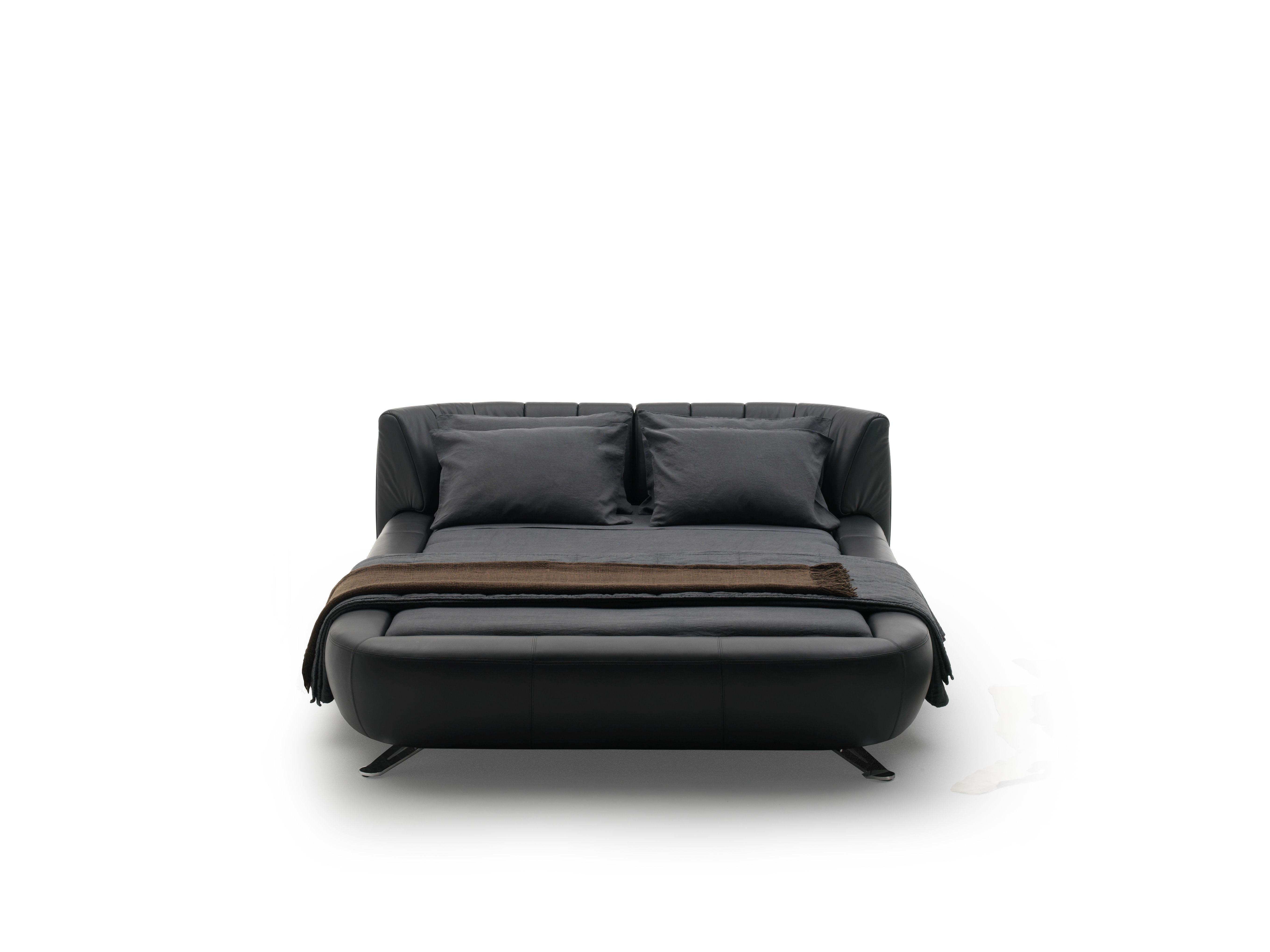 DS-1164 bed by De Sede
Dimensions: D 251 x W 202 x H 47 cm
Materials: metal construction, leather

Prices may change according to the chosen materials and size. 

Playful design for sensual moments

Backrests can be easily and quickly moved