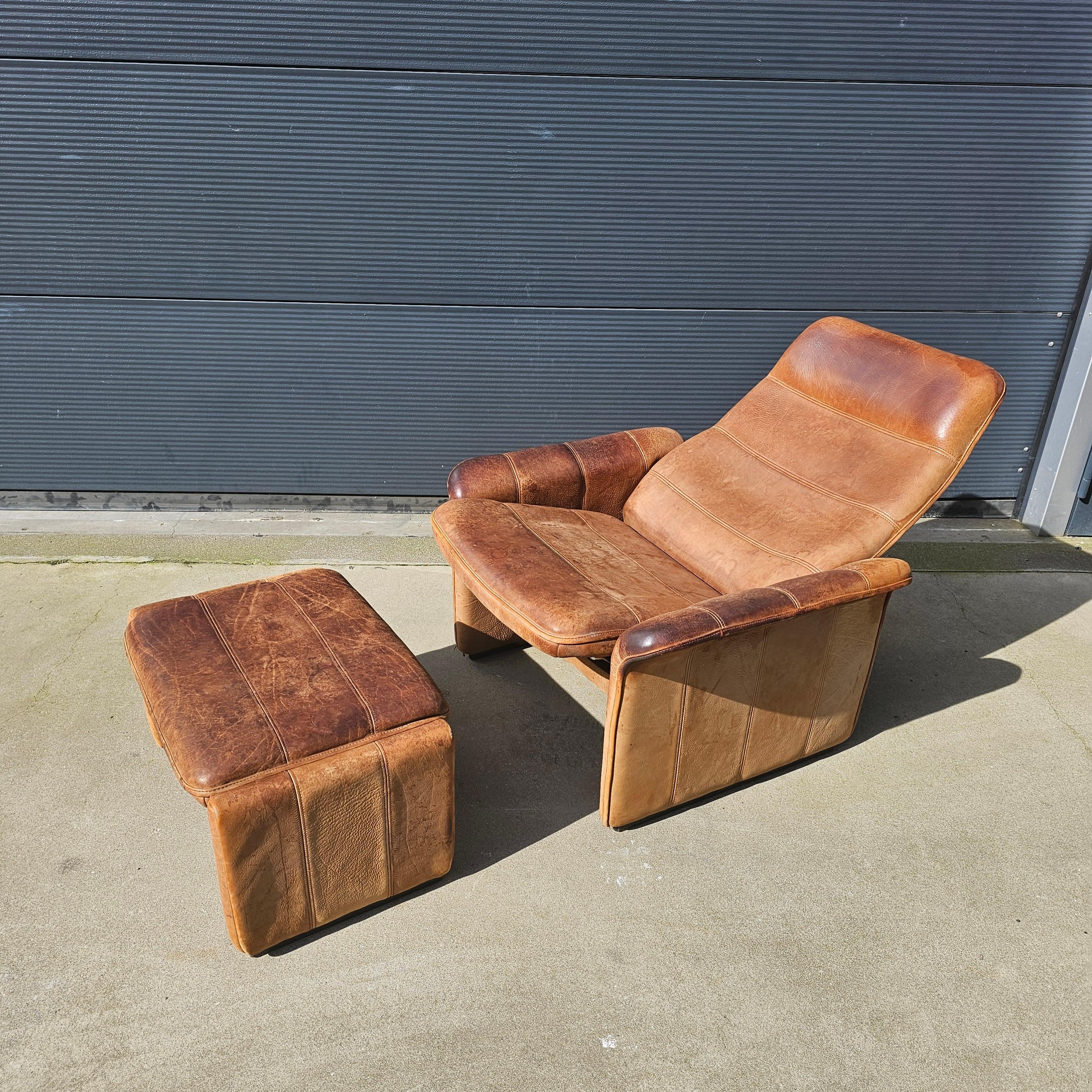 Swiss DS 50 Buffalo Neck Leather Lounge Chair & Footstool by De Sede, 1970s For Sale