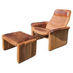 DS 50 Büffelnacken-Loungesessel und Fußhocker aus Leder von De Sede, 1970er Jahre