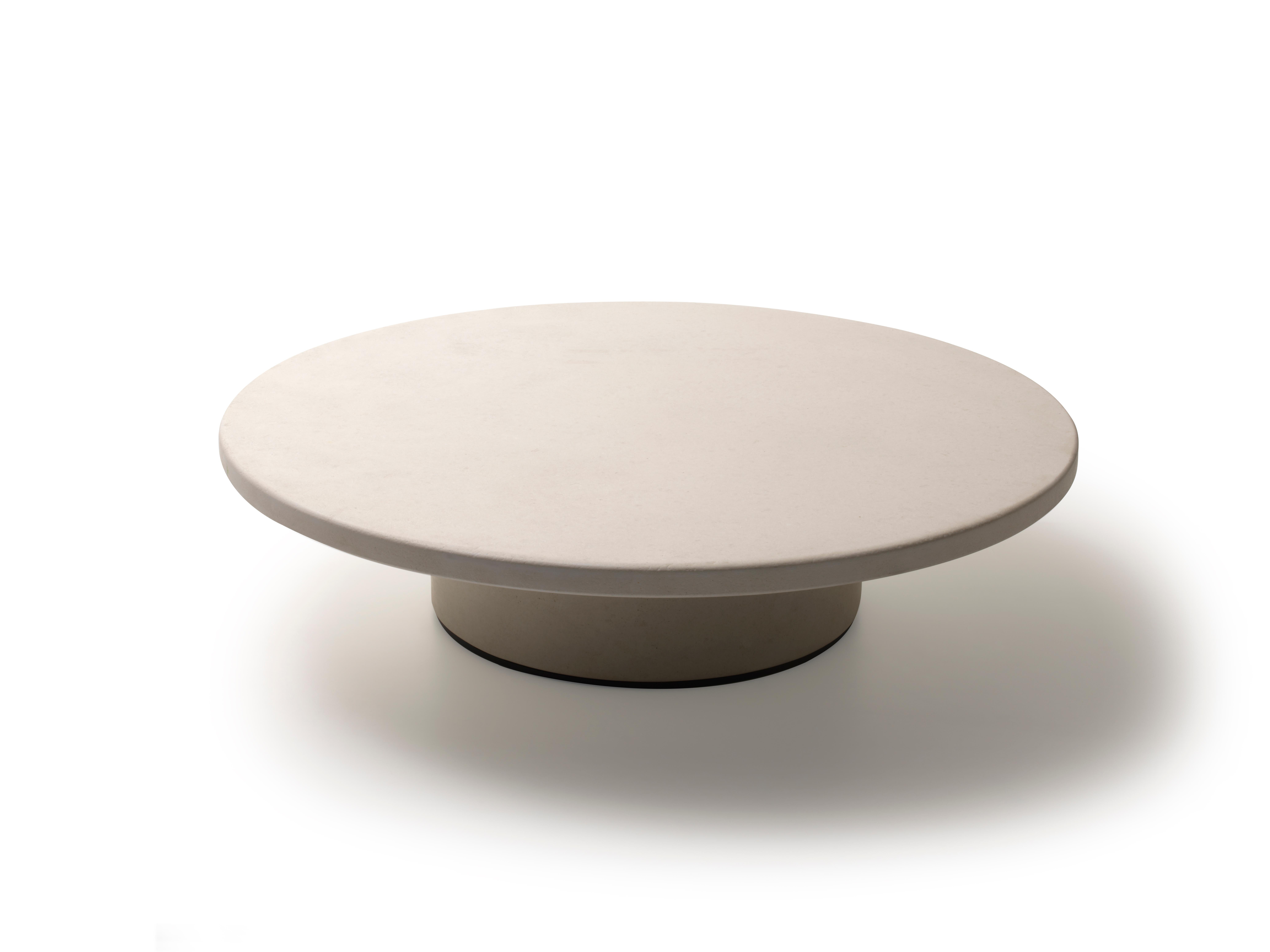 DS-612 coffee table by De Sede
Designer: Mario Ferrarini
Dimensions: D 120 x H 29 cm
Materials: mixtures of stone or metal; tabletop with MDF core. Column made of moulded plywood.
Colours: metal brass, metal iron, marble Carrara, stone coral,