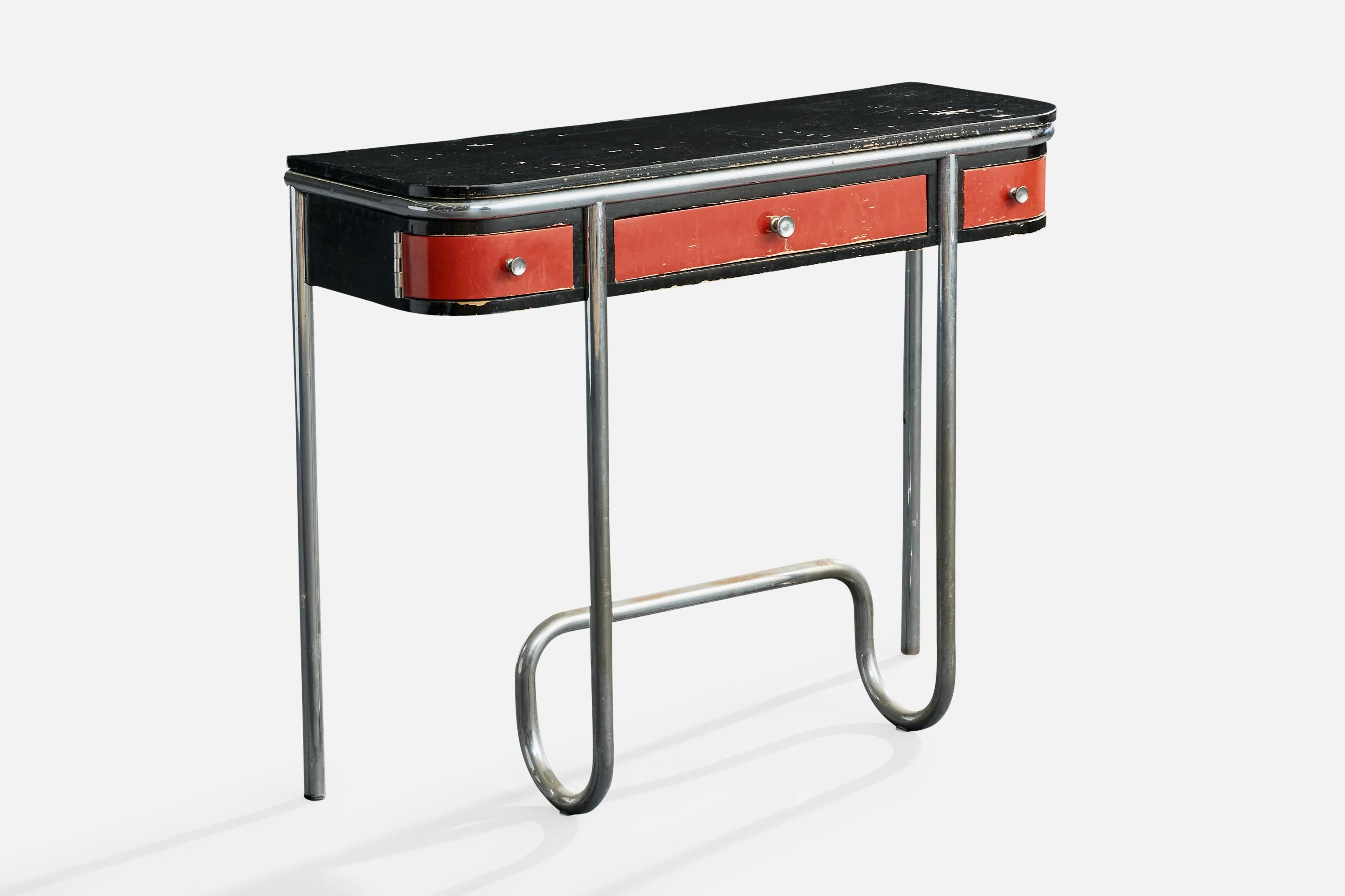 A red, black-lacquered wood and tubular steel console table produced by DS Stålmöbler, Sweden, c. 1930s.

Moderate cracking and peeling of tabletop surface, siding, and drawer faces.

Side drawers are both hard to open; all three drawers have