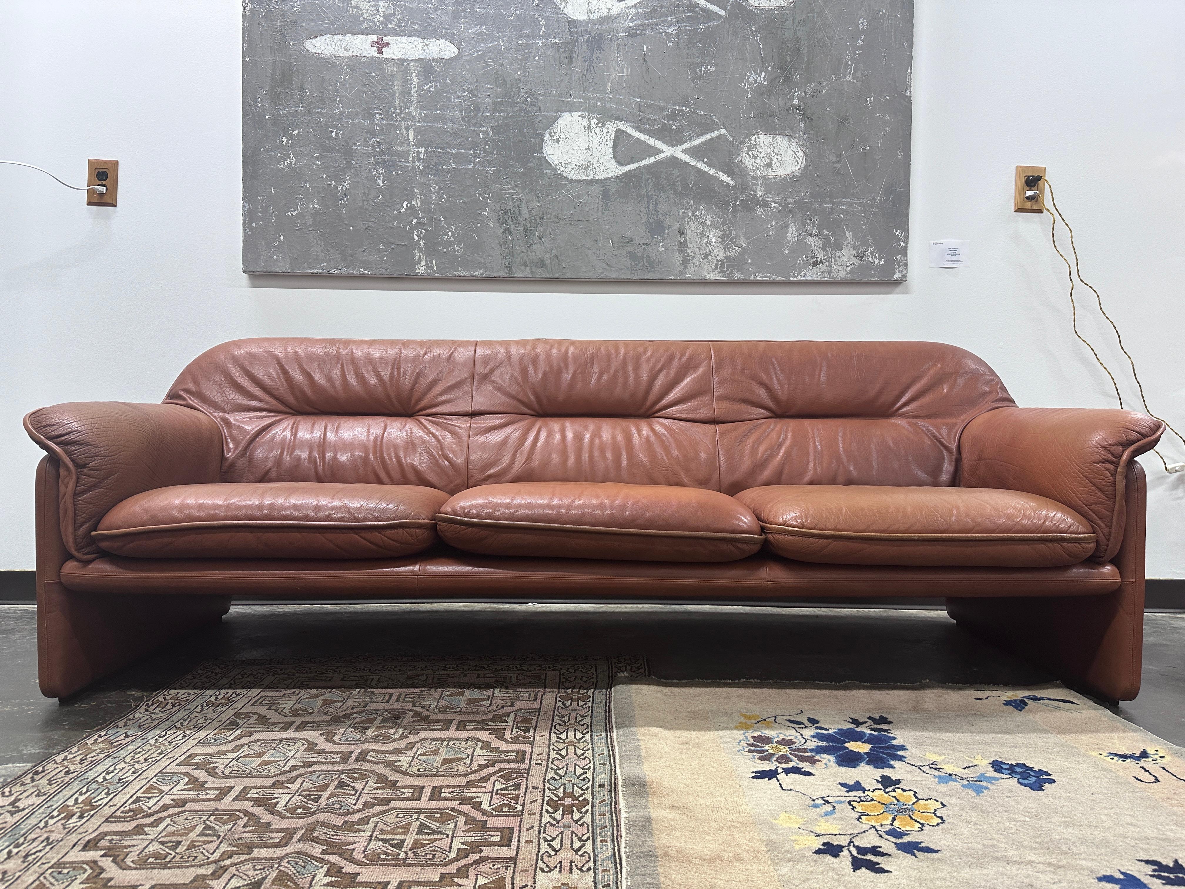 DS16 three-seater sofa by De Sede in excellent vintage condition. There is minor staining and wear consistent with age. Back cushion is one large piece that removes, and there are three seat cushions.