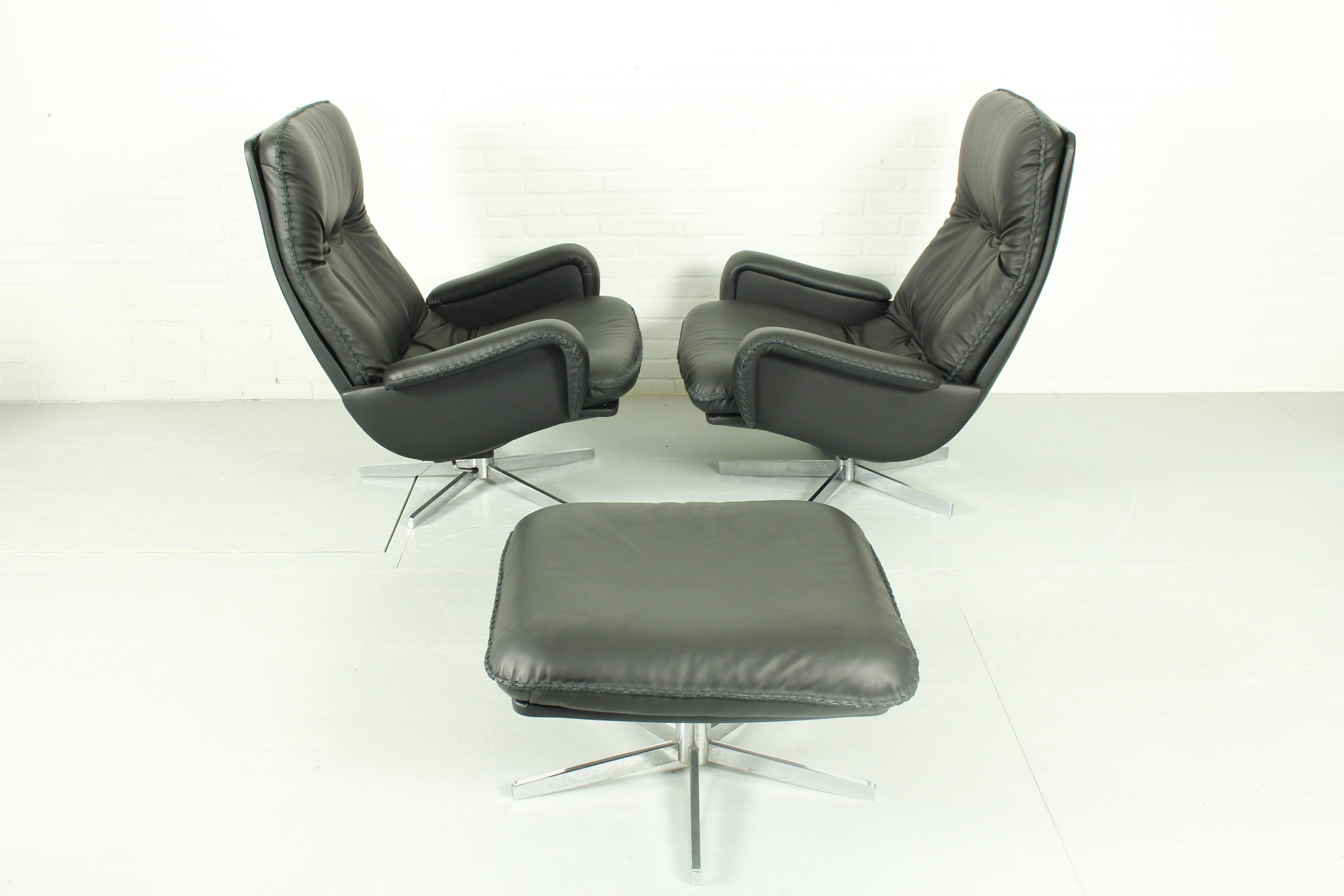 Mid-Century Modern DS231 James Bond highback swivel chairs and matching ottoman by de Sede Switzerl For Sale