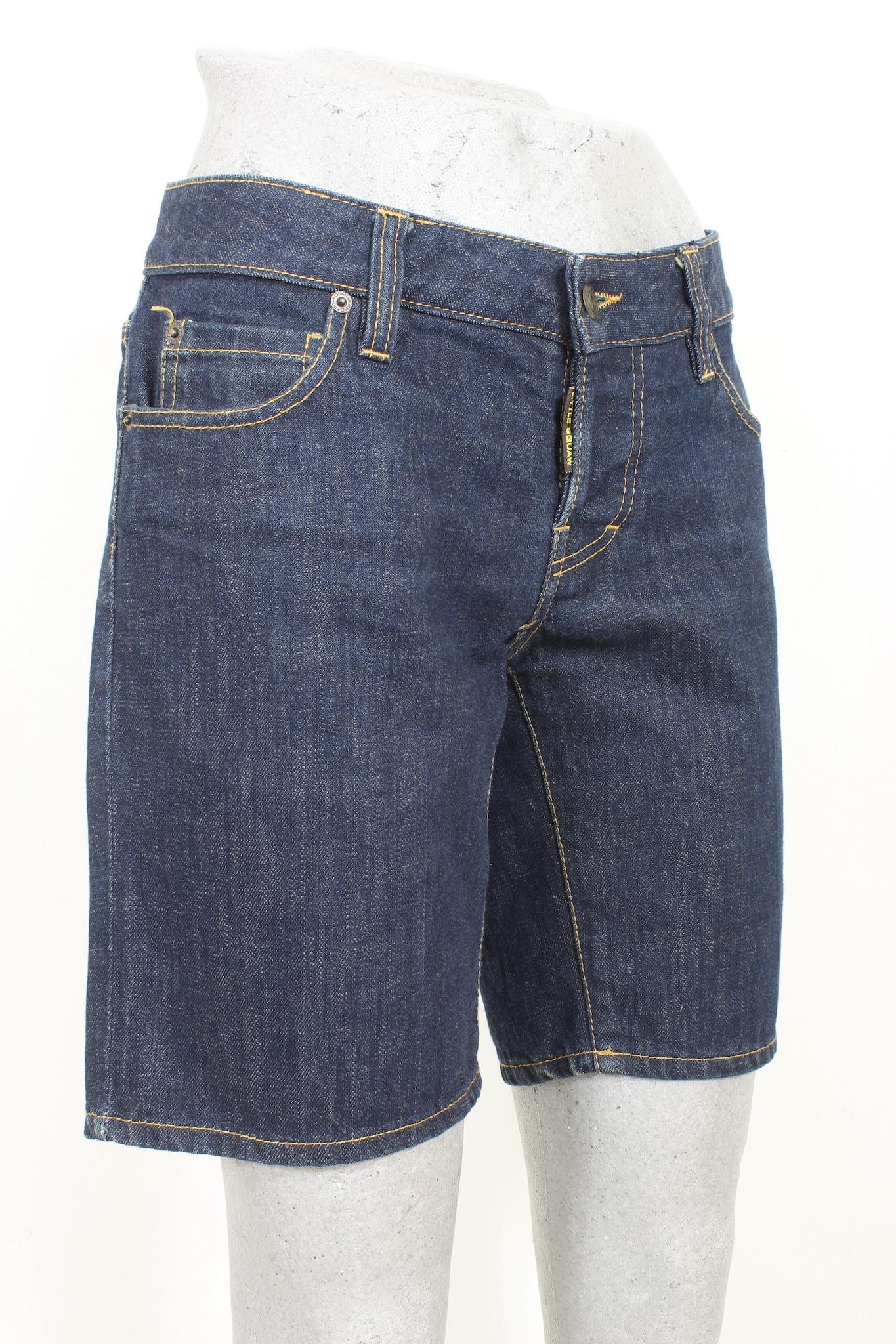 Experience casual style with these Dsquared Blue Cotton Short Denim Trousers from the 2000s. Crafted of 100% cotton in a medium-wash, these jeans promise both comfort and style. Enjoy timeless denim looks with a modern twist.

Size: 42 It 8 Us 10