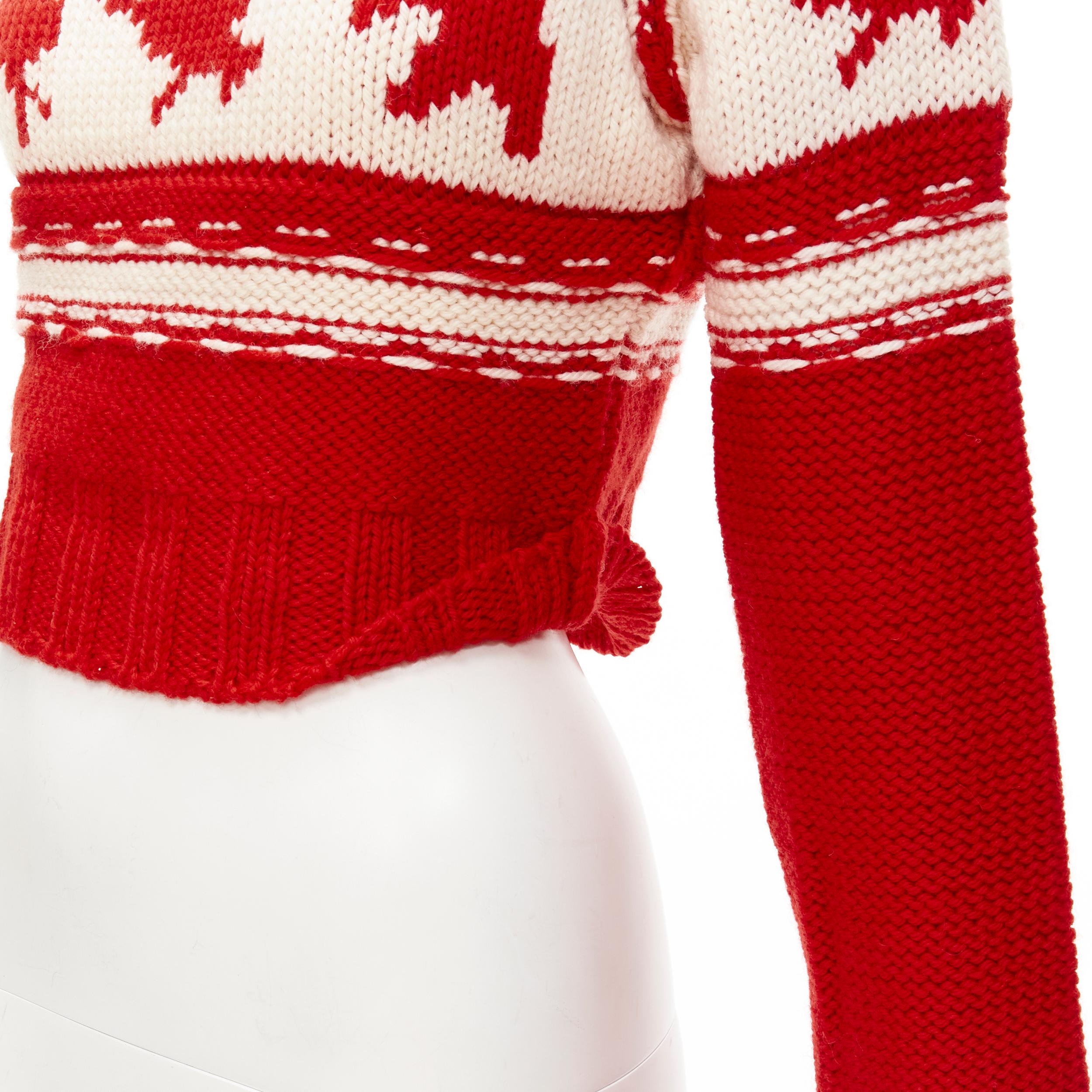 DSQUARED Vintage red white Canadian Christmas cropped turtleneck sweater S
Brand: Dsquared2
Material: Feels like wool
Color: Red
Pattern: Abstract
Extra Detail: Turtleneck collar. Raglan sleeves. Cropped fit.

CONDITION:
Condition: Excellent, this
