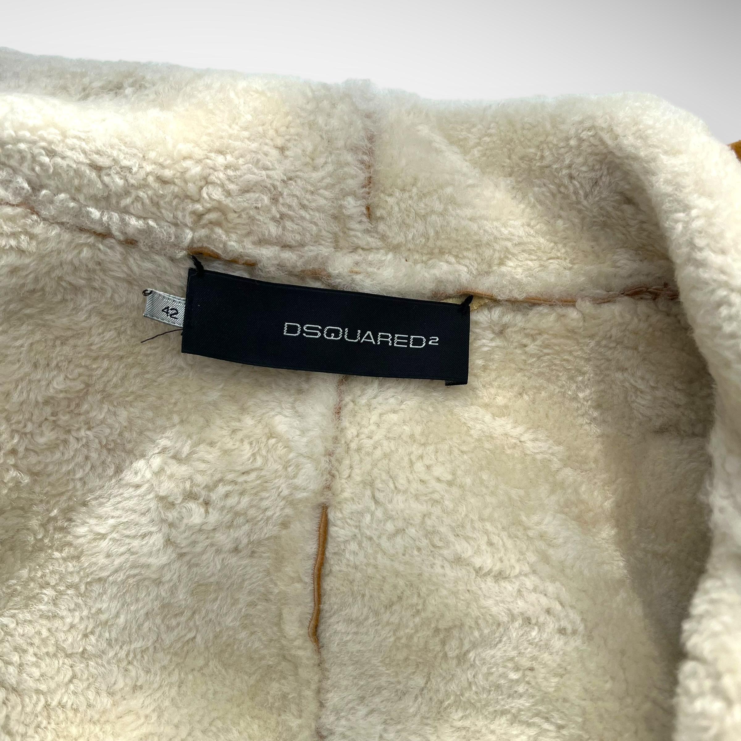 Dsquared2 2003 FW collection
Ensemble

Denim Micro belted skirt

bondage features
dark wash denim fabric with a front zipper and brown leather adjustable straps adorned with golden rings
Size: 38 circa S
Condition: 7/10, Good preloved condition,