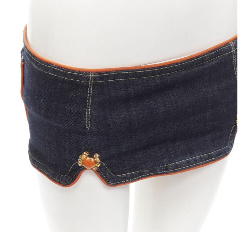 DSQUARED2 2005 Runway orange crab button denim micro mini skirt IT40 S
Reference: ANWU/A01012
Brand: Dsquared2
Collection: 2005 - Runway
Material: Denim
Color: Blue, Orange
Closure: Zip
Extra Details: Indigo denim with orange piping. Gold-tone