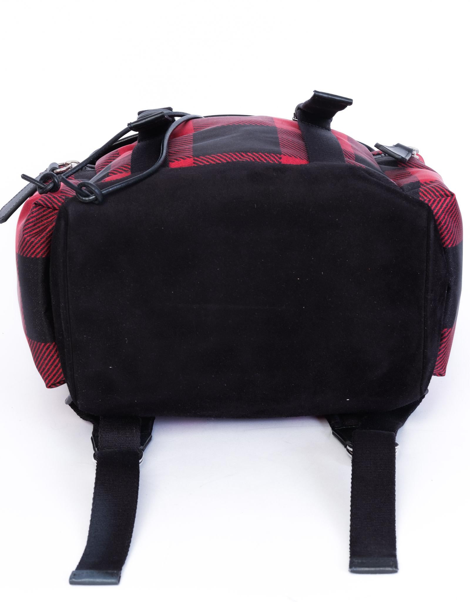 red and black plaid backpack