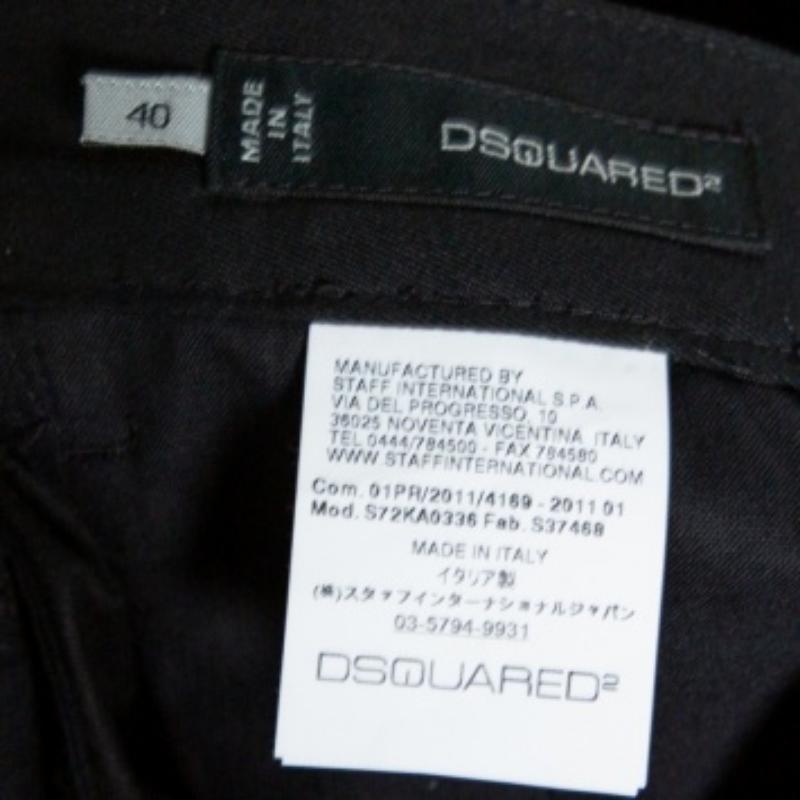 Dsquared2 makes looking good easy, courtesy of these cotton trousers. Cut with a tapered fit in a classic black tone, these are a pair to feel great in. It features a mid-rise, a waistband with belt loops, a concealed button fastening, side slit