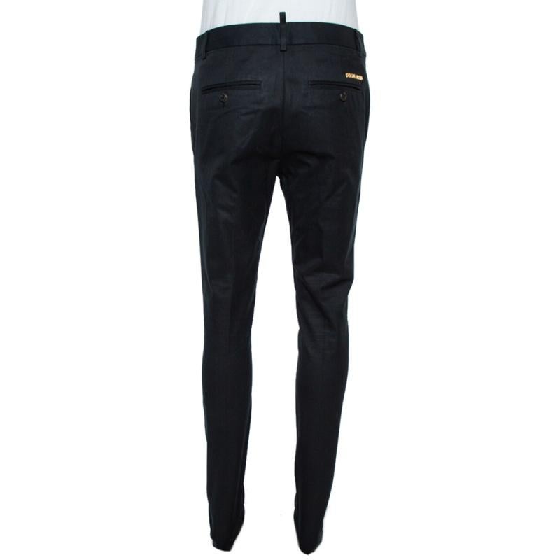 Dsquared2 makes looking good easy, courtesy of these cotton twill trousers. Cut with a tapered fit in a classic black tone, these are a pair to feel great in. It features a mid-rise, a waistband with belt loops, a concealed button fastening, side