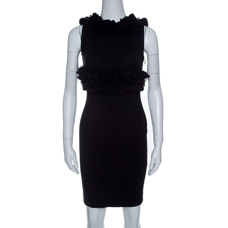 This creation by DSquared2 is so perfect it will not only give you a fabulous fit but will also lift your spirits because wearing good clothes can give one a pleasant feeling. In a black shade, this bodycon dress flaunts ruffle trims and a side