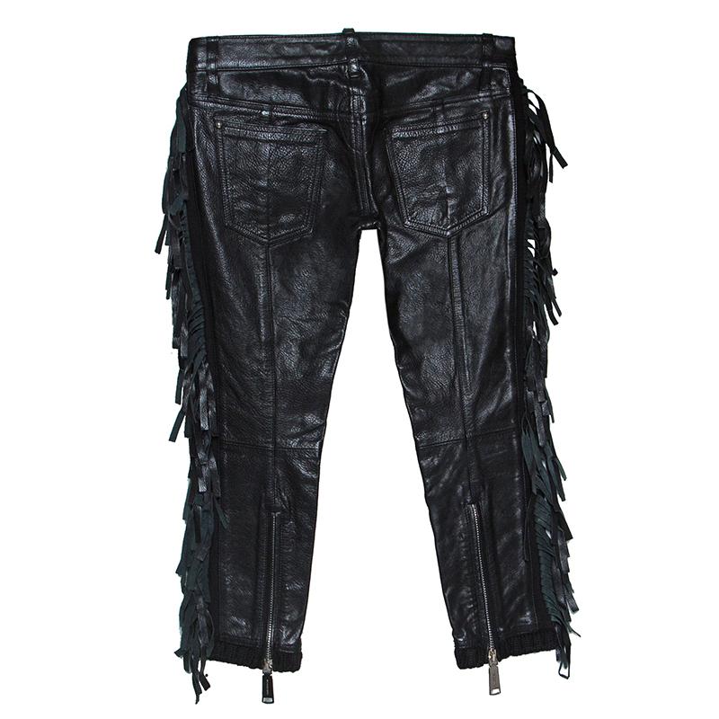 These stunning pants by Dsquared2 are stylish and edgy. They are crafted from 100% calf leather and come in classic back. These cropped pants feature fringed trims on the sides, six pockets, zip detailing on the back, belt loops, button closure and