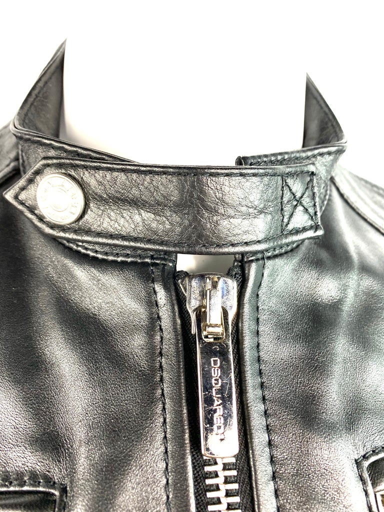 Product details:
Size 44
100% leather
Featuring moto style leather  jacket with silver tone hardware, collar, four six front pockets, front zipper closure, zipper and metal click in button closure on the bottom of each sleeve. All the hardware is