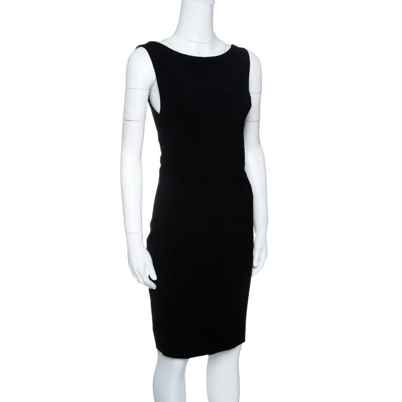 This black sheath dress is one staple piece you must have in your closet. The sleeveless wool blend dress from the label Dsquared2 has a fitting silhouette and a stylish neckline. The dress is complete with a concealed zipper at the back.

Includes: