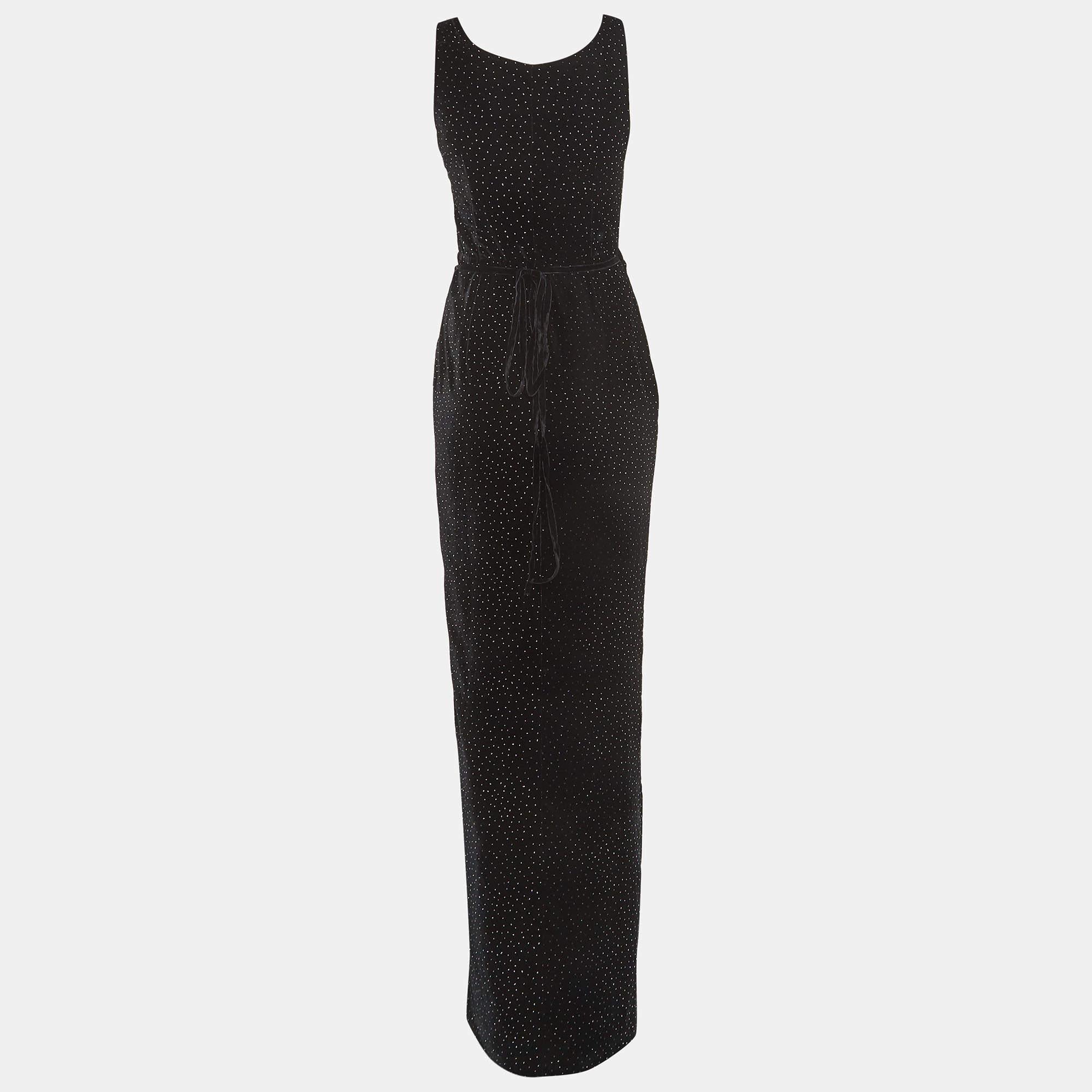 Meticulosamente confeccionado para un ajuste impecable, este vestido de noche negro Dsquared2 ofrece una comodidad inigualable gracias a sus materiales de primera calidad. Su diseño atemporal lo convierte en una opción versátil para cualquier evento